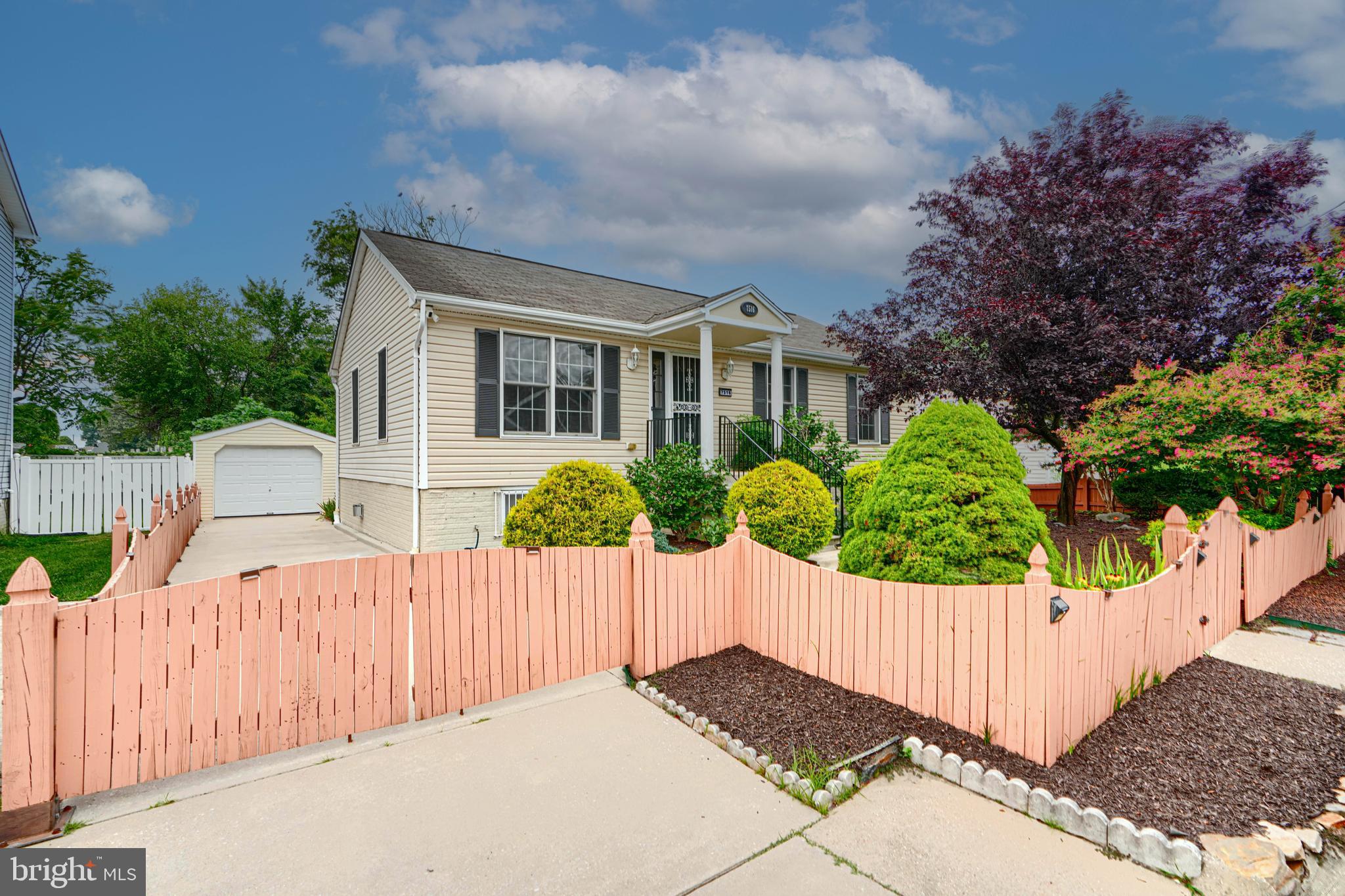 Sparkling clean and beautifully maintained, this Dundalk home feels brand new—inside and out. Wonderful floorplan offers functionality, comfort, and versatility... all with modern day amenities. Attention to detail is immediately evident from the well manicured and landscaped exterior to the meticulous interior finishes. Built in 2005, this porch front rancher offers 2000 +/- sq. ft. of thoughtfully designed space with versatility for extended guests, multi-generational living, or even potential rental space. Nestled in a well-established neighborhood on a tranquil 0.16-acre lot backing to woods, enjoy both privacy and convenience to local venues and major roadways. The exterior is highlighted by an oversized detached garage and long driveway allowing for easy parking. The rear yard is fully fenced with a large covered porch and green outdoor space ideal for gardening or quiet relaxation. The interior is bright and inviting. The sun filled main level boasts hardwood floors, neutral paint, decorative light fixtures and ceiling fans. Central to the home is the generously sized living room opening to a spacious kitchen and dining area. The newly updated kitchen showcases gorgeous quartz countertops and decorative backsplash, stainless appliances, loads of cabinetry and island with overhang for seating. The living quarters are tucked away off the main living area for ideal privacy. A generously sized primary bedroom with en suite, two additional bedrooms and well appointed full bath along with convenient washer and dryer complete the main level. The fully finished lower level offers a separate living quarters with interior and exterior access. You’ll be amazed by this space which encompasses a large family room with gas fireplace, kitchenette, bedroom, full bath, 2nd laundry room and utility room. **2 separately deeded lots are included with this sale**