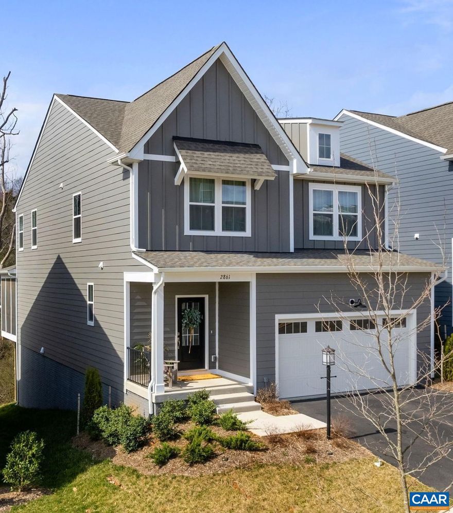 Beautifully situated at the foothills of the Blue Ridge mountains, this "like new" home in Crozet / Western Albemarle is in model home condition and over 3300 finished square feet. This home is still under warranty in the brand new neighborhood of Pleasant Green and walking distance to downtown Crozet. The "Rosemund" model is located on a private, premium homesite and is loaded with upgrades. You will enjoy the screened porch overlooking the peaceful, wooded common area featuring the sounds of the "rambling brook".Spacious 2-car garage, mud room cubbies and open floor plan with a wall of back windows to enjoy the wooded view. Loads of cabinets and counter space including a large island in the gourmet kitchen. The main level office offers the perfect "work form home" space. Huge primary suite with double vanities and double walk-in closets, and a convenient laundry room. The walk-out terrace level has 9' ft foundation walls and features a bedroom, a full bath and a finished rec-room.  A total of five bedrooms and three and a half baths.,Granite Counter,Maple Cabinets,Quartz Counter
