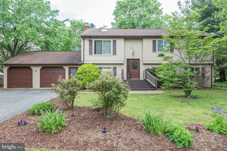 Beautifully updated, landscaped home in Grapewood Estates in highly sought after Kettle Run School district! Fresh paint throughout, refinished hardwood floor in living room, dining room and upstairs hallway and new carpeting on stairs and lower level. Upgraded Anderson windows, fairly new hot water heater and expansion tank. Beautiful private shaded lot in quiet cul-de-sac. MOVE IN READY!
