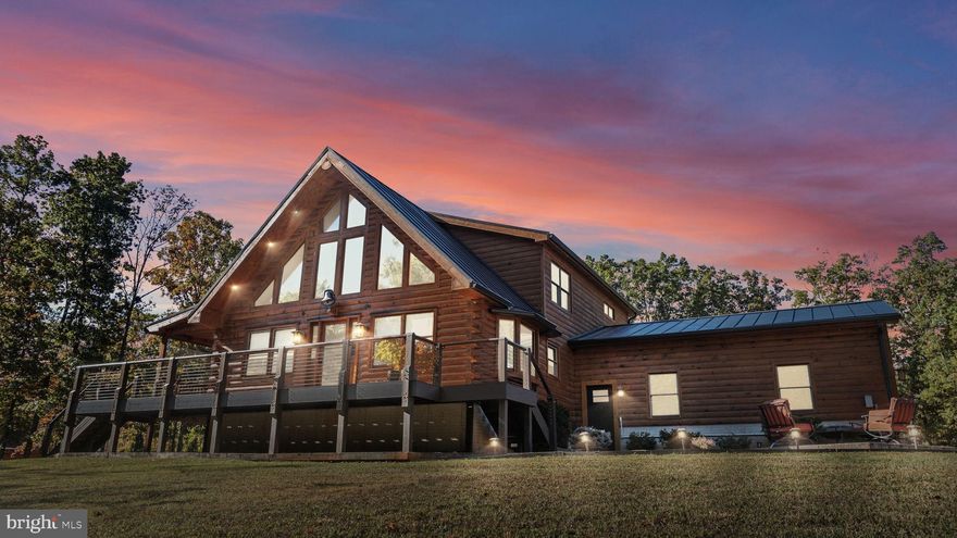 Looking for a VA Assumable Loan on a Custom Craftman Home with AMAZING upgrades??? This is the ONE! 

**Your Private Retreat Awaits: Exquisite Craftsman Log Home on 8 Acres!**

Are you searching for a serene escape that blends luxury with the charm of a custom craftsman log home? Look no further! This meticulously updated property offers the ultimate private retreat, nestled on **8 lush acres** within a tranquil subdivision, free from HOA restrictions.

Upon entering, you’ll be captivated by the **soaring beam ceilings** and elegant wood trim, complemented by stunning shiplap walls that create an inviting warmth and character. The **open floor plan** unites the spacious great room—featuring a cozy gas fireplace—with an expansive kitchen and dining area, perfect for both entertaining and everyday living.

The heart of this home is its beautifully appointed kitchen, showcasing **brand new appliances** and generous counter space, a culinary dream for any home chef. The first-floor primary suite serves as a luxurious sanctuary, complete with a private bath and a large walk-in closet. Upstairs, another primary bedroom with an en suite bath and a cozy loft overlooks the grand great room, offering a perfect retreat for guests.

Descend to the lower level, where a separate entrance leads to a versatile space ideal for visiting family, an in-law suite, or a potential short-term rental. This area includes an additional bedroom, a full bath, and a dedicated office space, along with ample storage.

Step outside to discover your expansive **TimberTech deck**, designed for relaxation and enjoying the beautiful surroundings. The property boasts a remarkable **40’ x 50’ detached garage workshop**—ideal for hobbyists and entrepreneurs—with oversized doors, an office area, and a car lift. A **15’ x 35’ lean-to** provides even more space for woodworking or equipment storage.

With a new metal roof, upgraded HVAC system, and impeccably maintained exterior, this home combines stunning aesthetics with practical living. Just moments from Lake Anna, you can enjoy sun-soaked days on the water, embracing the outdoor lifestyle you've always dreamed of.

This craftsman log home is not just a house; it's a private sanctuary that offers the perfect blend of modern comforts and rustic charm. Don’t miss your chance to own this exceptional property—schedule your private tour today and experience firsthand the unique allure of this retreat!

Here is more detailed information on the renovations: HVAC system replaced, new metal roof installed and outside re-stained and sealed in 2022. New Gutters, Tankless Hot Water Heater, and kitchen appliances added in 2023. New carpet just installed in the main floor bedroom October 2025. VA assumable loan!