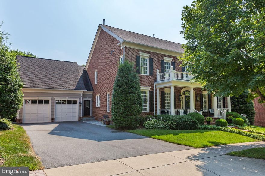 CLASSICALLY STUNNING 5BR/4.5BA COLONIAL with excellent millwork and a desirable floor plan. Picture perfect with wonderful curb appeal and outdoor space! Fantastic Great Room with Sunroom addition. 3 gas fireplaces. Gourmet Kitchen w/ Breakfast Area. Walkout LL with Rec Room and wet bar. LL Bedroom and full Bath - ideal for an In-Law/ Au Pair Suite. Rear Deck and Patio - perfect for entertaining!