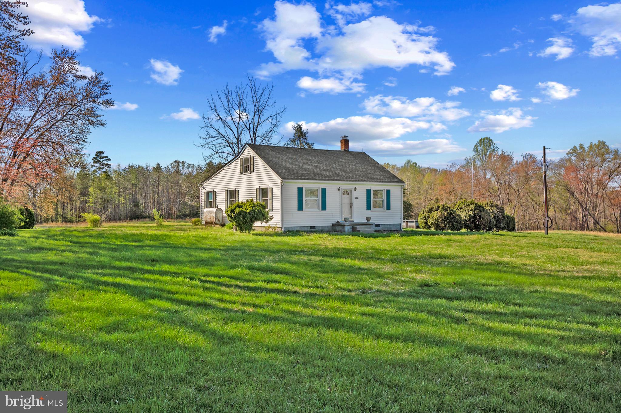 PRICE REDUCED – EXCEPTIONAL INVESTMENT & LIFESTYLE OPPORTUNITY!
Welcome to this charming farmhouse on over 42 acres of peaceful countryside, just minutes from Lake Anna! Now offered at a newly reduced price, this one-of-a-kind property blends rural living with incredible potential. The motivated seller presents a unique opportunity for buyers looking for a private retreat, homestead, or long-term investment.
The land is subdividable, offering potential for development, a multigenerational estate, or future resale. With mature timber, open pastures, and multiple outbuildings, it's perfect for homesteading, farming, or outdoor recreation.
The well-maintained farmhouse features 2 bedrooms, 2 full updated bathrooms, and over 1,400 sq. ft. of inviting living space. Modern updates, including a newly renovated second bathroom and laminate flooring, offer comfort and charm. An enclosed sunroom provides peaceful views of the surrounding acreage.
Additional features include multiple sheds, laundry hookups, and room for horses, chickens, goats, and more. Enjoy true freedom and flexibility in this serene rural setting.
Conveniently located near Lake Anna, this property is ideal for those seeking privacy, expansion potential, or a smart investment. Don’t miss this rare opportunity—schedule your private tour today!