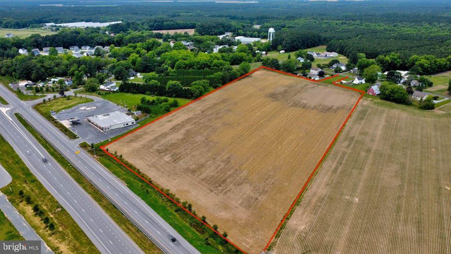 Just reduced and will sell quick--don't wait as opportunity awaits for the right buyer. This 15.63 acres of land in town limits of Newark, MD with Rt. 113 road frontage and deeded 35 ft. commercial entrance off Rt. 113. Approximately 4-5 acres (no updated survey on file, this is an estimate based on aerial maps) of the land is located in the V-1 zoning district within Newark town limits--It is unknown at this time how many remaining EDU's are available for purchase through Worcester County  (at last check the cost for each EDU purchase was $8156  each). This parcel was subdivided removing the farmhouse located at 8506 Newark Rd., but the 15.63 is the remaining amount of vacant land for sale and there is also the possibility of more subdivision.