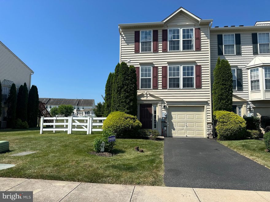 Welcome to 51 Dare Lane in the highly  sought after community of Coventry Glenn. This stunning end of row town home features three bedroom and two and a half bath with a one car attached garage which has an outlet for an electric car.  This home sits on a magnificent lot backing up to large open space and also has a fenced in side and rear yard with a large composite deck.  Upon entering the home through the foyer on the ground level you have two large closets, access to the garage, a mechanical room, laundry room and a large finished family room with access to the rear yard.  Moving upstairs to the second level, you have a large spacious living room with newly installed hardwood floors, another closet, a half bath and then an open kitchen with center island and breakfast nook with additional dining area at the rear of the home which has has patio sliders that lead out to the deck. Moving up to the third level, you have three bedroom with a three-piece hall bath,  and an en suite bathroom in the master bedroom that features dual vanities, soaking tub, and stand up shower.  The master bedroom also has a huge walk in closet.  Some additional features to note on this home, the current owner installed all new hardwood steps from the ground floor up.  New hardwood floors installed in Spring 2021  in the living room to notch the hardwood floors in the kitchen and dining room.  There is a newly installed split system HVAC unit installed in September 2023 and also a new hot water heater installed in September 2023 which is a zoned system with 2 thermostats..  There is a new roof that was installed in August 2023.  This home also features surround sound on all levels and the seller is leaving the equipment behind. It came with the home when they purchased, and they never really used it. This town home has the structural options which bumped out all three levels to maximize living space and square footage.  This home is ready to move in just unpack your bags. Don’t let this one pass you by make your appointment today!!!