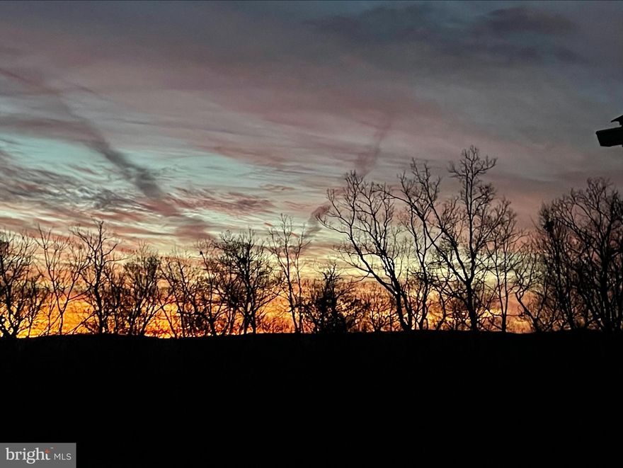 Why wait for new construction when you can have this beauty which isn't even 2 years young!  Current owner had a life event which required her to move ... come snatch this up!  Beautiful views of the sunrise from the front porch .. check!  Spacious open floor plan ... check!  One level living ... check!  Mountain views ... check!  Rear deck to watch the sunset ... check!  Located only 20 minutes from Winchester, barely over the WV line.  Come see this 2+ acres of almost heaven.