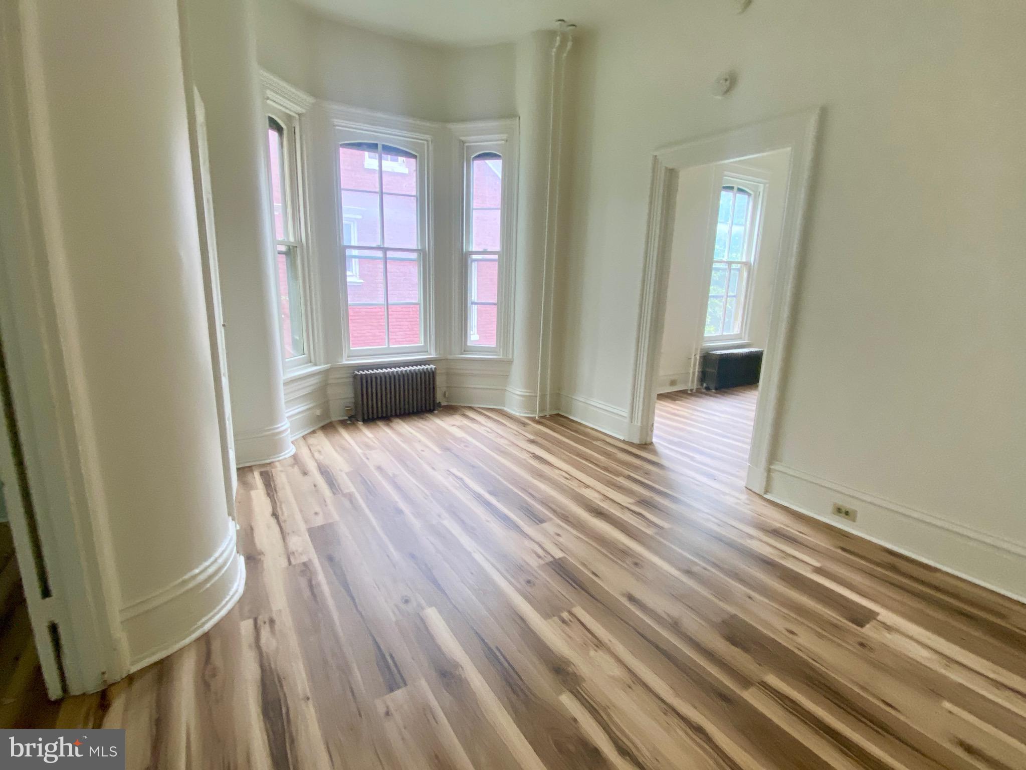 Enjoy peaceful river views and fresh air from your private balcony in this beautifully updated second-floor 1-bedroom apartment. This charming unit features brand-new flooring, an in-unit washer and dryer, and plenty of natural light throughout. Located just minutes from Columbia's vibrant downtown, you'll have easy access to shops, restaurants, and scenic walking trails along the Susquehanna. Quiet building, great location the perfect blend of comfort and convenience.
Tenant pays gas and electric. No pets.
Beautiful building built in the historic community of Columbia PA. Constructed with, the once popular, arched windows and intrigant large doors.