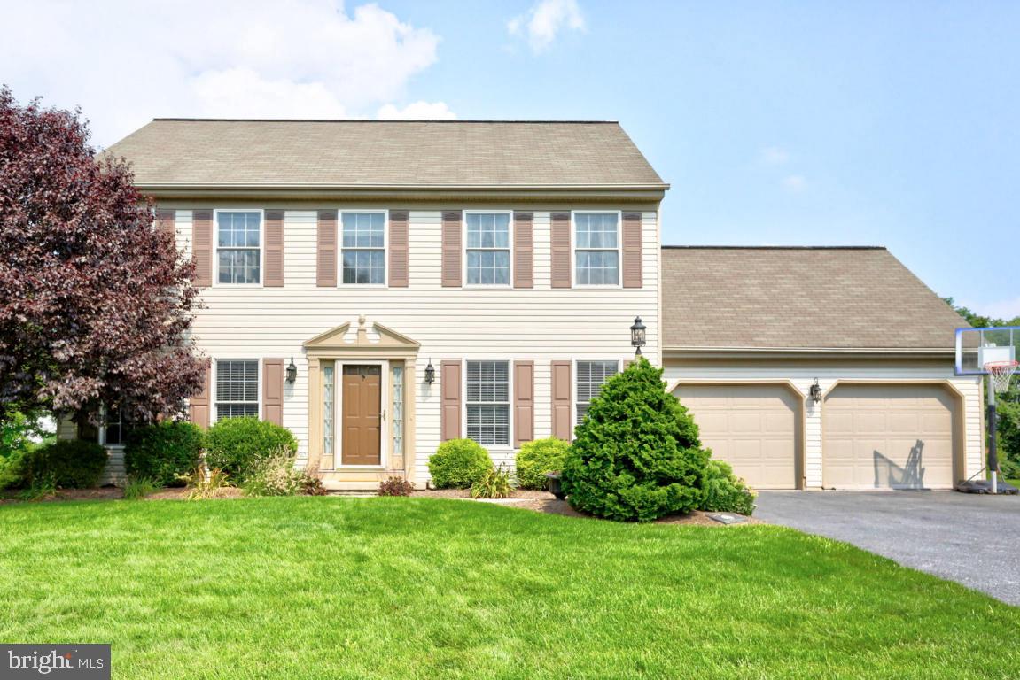 What a dream home filled with endless possibilities to entertain indoors and out, especially around the oversized L-Shaped pool with a shallow end and a deeper end that has a diving board, or entertain on the 31x12 deck!. Inside on the main level, this home boasts Hardwood floors throughout the 1st lever, Family room w/ Fireplace, Updated kitchen with granite tops and farm sink, a double oven, eat-n-area, dining room and mud room. The lower level is a walk out finished basement with built in safe and exercise area. The top level has 4 nice sized bedrooms with a master suite and walk-in-closet...Most of the rooms have crown molding.