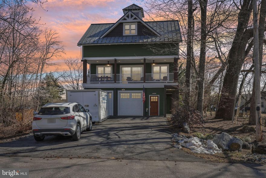 More details and professional photography coming soon, stay tuned! Architecturally distinctive and thoughtfully designed, this three-level contemporary residence offers 4 bedrooms, 2 full baths, and 2 half baths, all set on a corner lot in the established South Haven community. The home combines a flexible floor plan with curated custom details and multiple living spaces that adapt effortlessly to modern lifestyles. The entry level features a versatile bonus room that currently serves as a stylish home bar, complete with built-in elements and a nearby half bath. This space could easily transition into a private office, studio, fitness area, or guest suite depending on the next owner’s needs. The main living level is open and light-filled, anchored by a spacious kitchen with an oversized island, professional-grade gas cooking, and distinctive custom finishes. The kitchen flows seamlessly into the dining and living areas, creating an inviting environment for entertaining and everyday living. One standout feature of this home is the built-in dumbwaiter, offering effortless convenience for transporting groceries, firewood, and other essentials between levels. Upstairs, the primary suite offers a peaceful retreat with a private coffee bar, walk-in closet, and spa-inspired bath. Two additional bedrooms, a full hall bath, and an upper-level laundry area complete the sleeping level. A ladder-access rooftop lookout provides a unique bonus space and elevated 365 degree view of the South River / Broad Creek and the Southaven Community. Outdoors, mature landscaping and wooded surroundings offer privacy while maintaining proximity to community amenities. Extensive hardscaping, a detached storage shed, and pre-installed hot tub wiring enhance the backyard’s potential. Located just steps from the neighborhood park with convenient access to major commuter routes, this home delivers design-forward living paired with everyday practicality. Don't miss your chance to make this your new home!