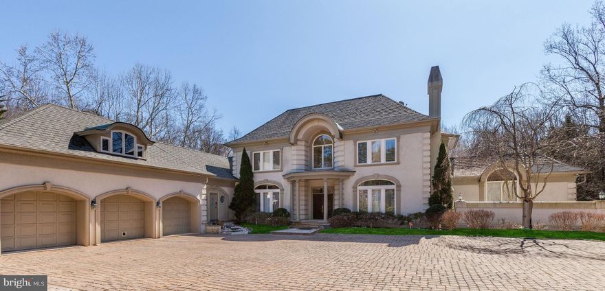 MOTIVATED SELLERS HAVE REDUCED $150,000.00! Welcome to a special home in Falconhurst, tucked away on a private lot in a neighborhood setting close to Potomac Village. Highlights include an elegant two story foyer with marble flooring, entertaining space with a spacious living room, dining room, family room and eat-in kitchen. The first floor master suite has lots of closet space and a large bedroom overlooking the treed lot.  There are three bedrooms on the second floor, each with ensuite baths, surrounding the balcony overlook.  The finished walkout lower level offers plenty of space including a large recreation room with wet bar, home theater, exercise room and two bedrooms with an additional full bath and powder room. The adjacent three car garage, brand new roof and  paved courtyard allow for easy parking. Large yard perfect for future pool!