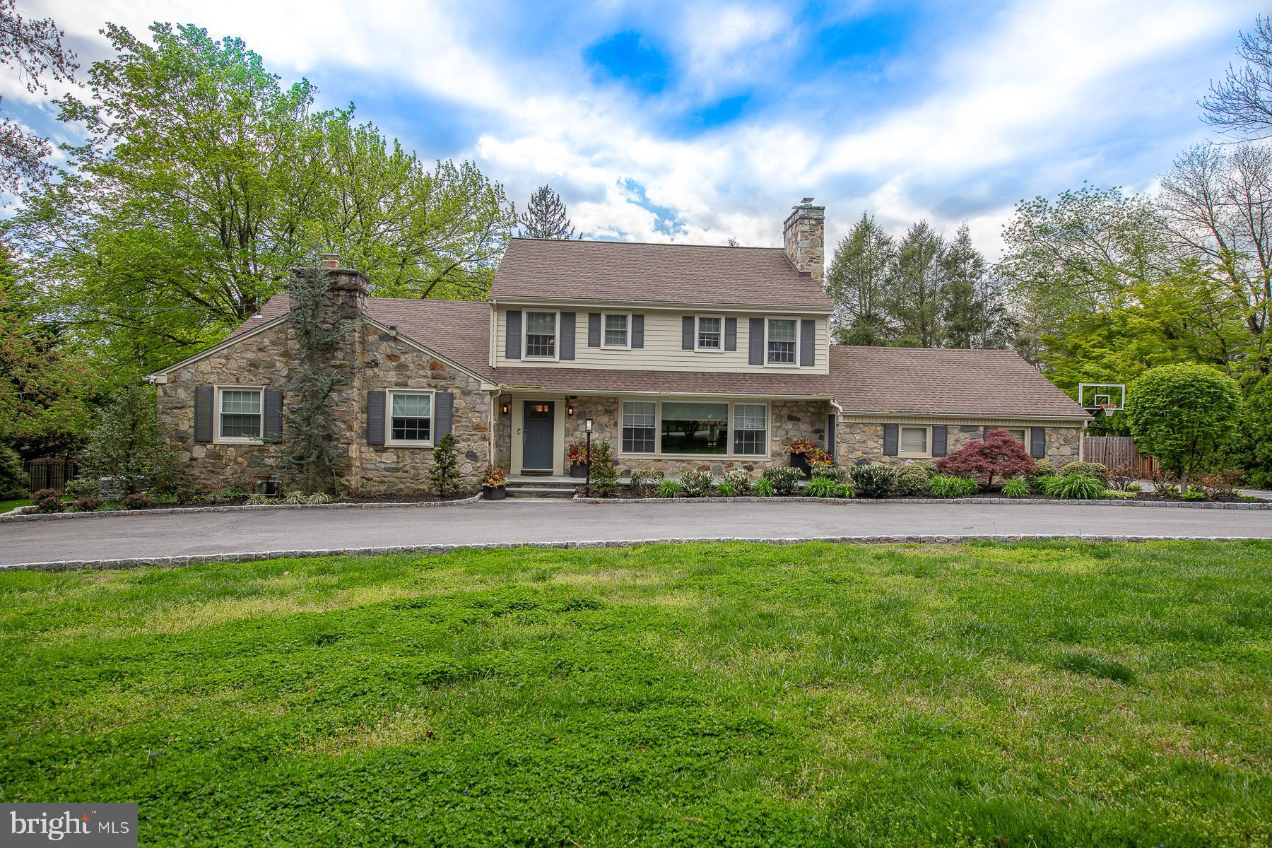 This 5 bed, 3.3 bath gem was completely renovated in 2013 with an attention to every detail and sits on 3/4 of an acre of picturesque grounds in the heart of Bryn Mawr. It is an intimate setting positioned far back from the road and screened by mature trees. A beautiful pool and park like feel will make it seem like you re on vacation every time you enter your back yard. This easy-to-live-in family home offers a great flow for indoor-outdoor entertaining. The main level features an eat in gourmet kitchen with a large bay window overlooking the beautiful travertine patio and pool. There is plenty of counter space perfect for meal prepping and a large center island for casual meals as a family. The cabinetry is Jim Bishop and the high-end appliances include a Thermador oven and refrigerator and Bosch Dishwasher. The kitchen leads to a sun filled and overly spacious living room with beautiful large windows and a gas fireplace. Across from the living room is the dining room which can seat 10 people comfortably and has a gas fireplace as well for those intimate family gatherings. The master suite boasts two large walk in closets and the private master bathroom has double sinks, an oversized shower and a separate vanity area outside of the bathroom. Directly off of the kitchen and leading to a lovely covered patio is a mud room equipped to hold everything you could possibly need with a large closet, three cubbies and additional storage space above. The second level offers four bedrooms, two full bathrooms and one half bath. Two of the bedrooms have custom designed closets and the other two have large walk in closets. There is a TV lounge area, which is a perfect set up for the kids to have a little bit of privacy! If that s not enough, the lower levels is a kids paradise. The large open floor plan offers a lot of space for games and lounging which makes this lower level a place you won't want to leave. Additionally there is a half bathroom, built in storage along an entire wall, and an arts and crafts alcove. Every thing you could possibly want to do in a home, has been done here. The semi circular driveway was recently enlarged so that two cars can easily park or get passed each other and brand new pavers surround the driveway. The front patio was redone with gorgeous blue stone. This beautiful family home is as turn key as they get. Home Inspection is available after offers are submitted