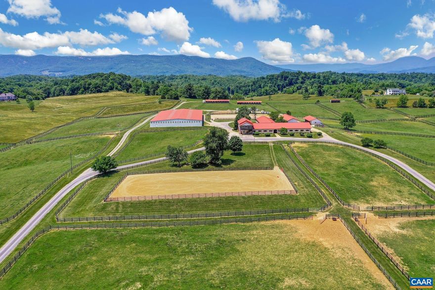 Main Gate Equestrian Center-where putting the horse first is a lifestyle. Our total package is offered with:50 ac feat a 34 stall European designed main barn. The barn mgr has accommodations on the 2nd floor of the barn w/a panoramic view of the farm. The farm entrance hosts a vintage cape code style home. In addition, the farm entertains an indoor arena. Towards the rear of the 50 ac, 2 hillside shed row barns add additional accommodations for overnight guests & clinic attendees. Ancillary amenities inc (2) outdoor arenas, warm up arena, 80 ft round pen & 24 paddocks.