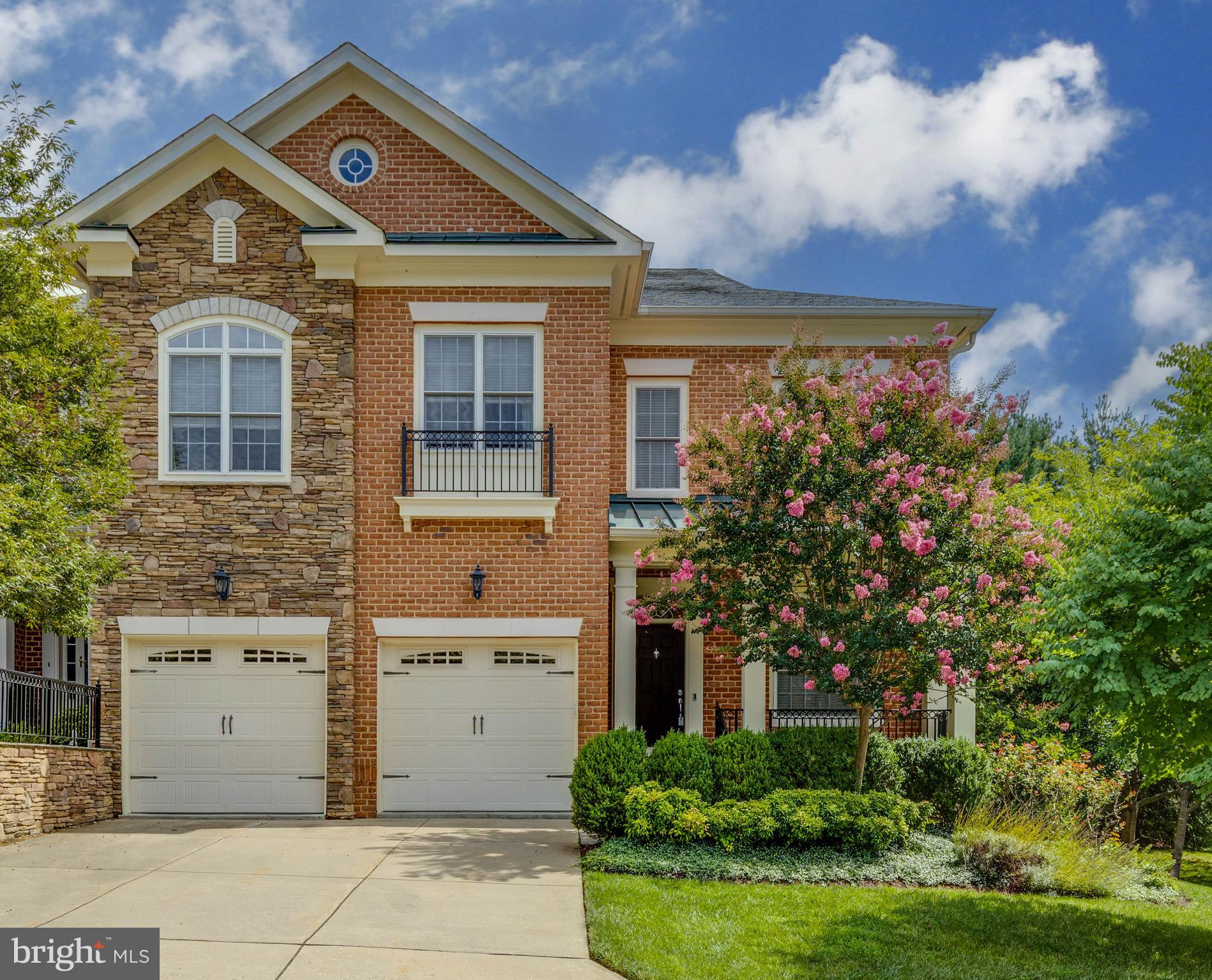 Live authentically. Unparalleled elegance in this sought after Cloisters at Charles end of group townhome. Immense natural light illuminates pristine interiors designed with contemporary flair by Rita St. Clair. An expansive deck with an automatic retractable awning extends your living space outdoors. Perfect for seamless entertaining. Exquisite lighting. Relax in the handsome library with custom built in bookshelves. Gather in your great room, anchored by a stately fireplace and a breathtaking wall of windows with views of evergreens in the distance. Three story elevator. The indulgent owner’s suite is a private retreat, featuring an ample dressing room and a refined spa bath for ultimate relaxation. Unwind in the lower level, complete with a custom-built wet bar and refrigerator, ideal for casual evenings at home. Xfinity Internet. Cultivate your existence. The art of uniting human and home.