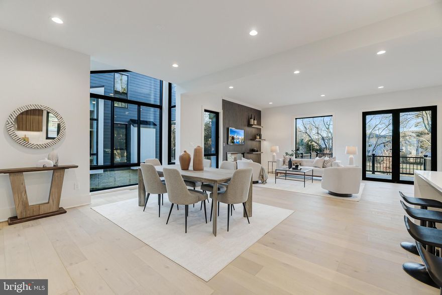 Experience the pinnacle of modern luxury in this stunning new build by KB Custom Homes, where impeccable design meets an unbeatable location. Welcome to "Willow" A  stunning 5-bedroom, 5.5-bath contemporary home with 4,200 SQFT of meticulously finished living space on  0.34 acre lot and an extensive fenced backyard.

The open-concept design flows effortlessly between the living, dining, and kitchen areas, enhanced by floor-to-ceiling windows that bathe the home in natural light. Every detail has been thoughtfully curated, from hardwood flooring throughout all three levels to soaring 10-ft ceilings on the main level and 9-ft ceilings upstairs and 9-ft ceiling in the basement. 
The heart of the home—the European custom-designed kitchen—is equipped with KitchenAid appliances. Additional highlights include engineered Hardwood on all 3 floors, distinct floating vanities in every bathroom, Ceramic tiles imported from Spain, Italy and Portugal, Oversized doors, Two electric fireplaces, Wood-paneled accent walls with light channels throughout, Floating stairs and wooden panels, and a fully finished basement—all designed to elevate your everyday living experience.

Situated in the heart of Falls Church, 3504 Lake St provides a rare balance of suburban tranquility and urban convenience. Just minutes from Lake Barcroft, Fairlington, Arlington, the Mosaic District, and Tysons Corner, you’ll enjoy easy access to premier dining and shopping. Major highways—including I-495, I-66, and Route 50—as well as the Falls Church Metro Station, ensure seamless connectivity to D.C., Amazon HQ2, and both Dulles (IAD) and Reagan National (DCA) airports.

For outdoor enthusiasts, the home is a short drive to George Washington Memorial Parkway, Benjamin Banneker Park, and Ocean Dunes Waterpark, offering endless recreational opportunities.