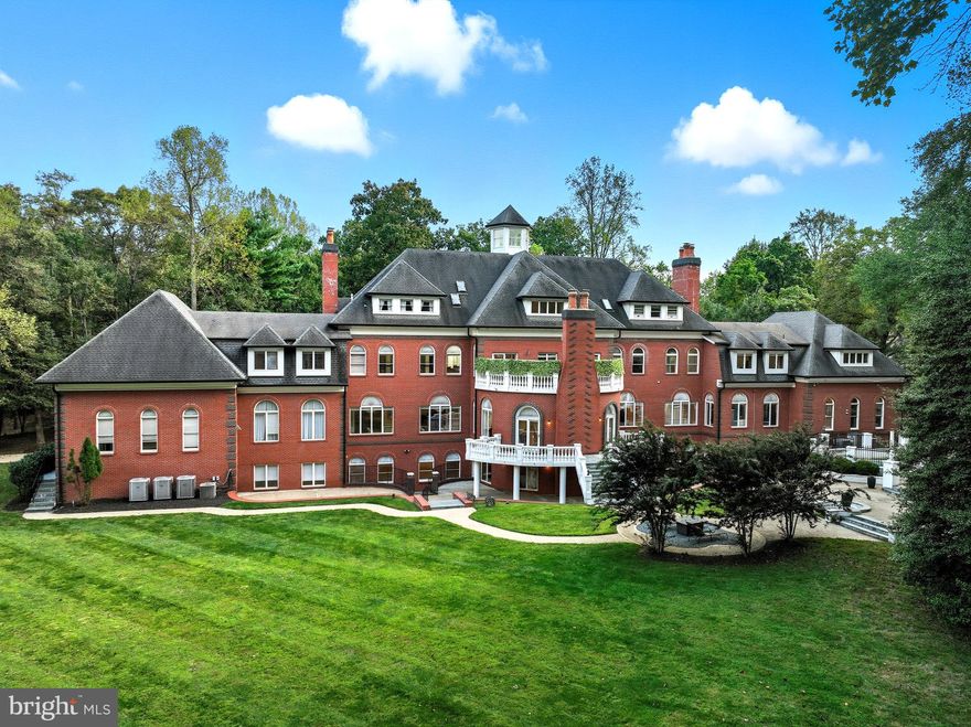 Incredible opportunity! This spectacular custom-built estate offers over 20,000 sq. ft. of luxurious living space on nearly 2 acres, ideally located at the border of Reston, Vienna, and Oakton in the heart of Northern Virginia’s tech corridor. Constructed with commercial-grade concrete and steel beam design, this home is built to impress and endure. Designed for both grand entertaining and everyday comfort, the residence features embassy-sized living and dining rooms, multiple kitchens including a full secondary kitchen ideal for for use as a catering kitchen, and an array of outdoor terraces. The lower level offers exceptional flexibility, easily accommodating business conference rooms, private office space, a fully equipped gym, or additional entertaining areas. Eight bedrooms, eleven full baths, and eight fireplaces provide abundant space for multi-generational living, while indoor and outdoor pools with spa create a true resort-style atmosphere. Access all 4 luxurious levels with your private elevator. Located just minutes from Tysons Corner, Reston Town Center, Dulles International Airport, major commuter routes, and downtown DC—and with no HOA—this one-of-a-kind estate offers unmatched convenience and lifestyle.