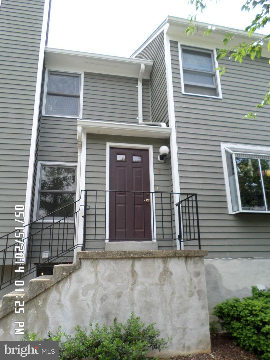 Spacious 2 bedroom townhouse with basement,  rear deck, recently renovated to include - painting throughout, new flooring (Laminate on first level/carpet on 2nd)  kitchen countertop, and more.
