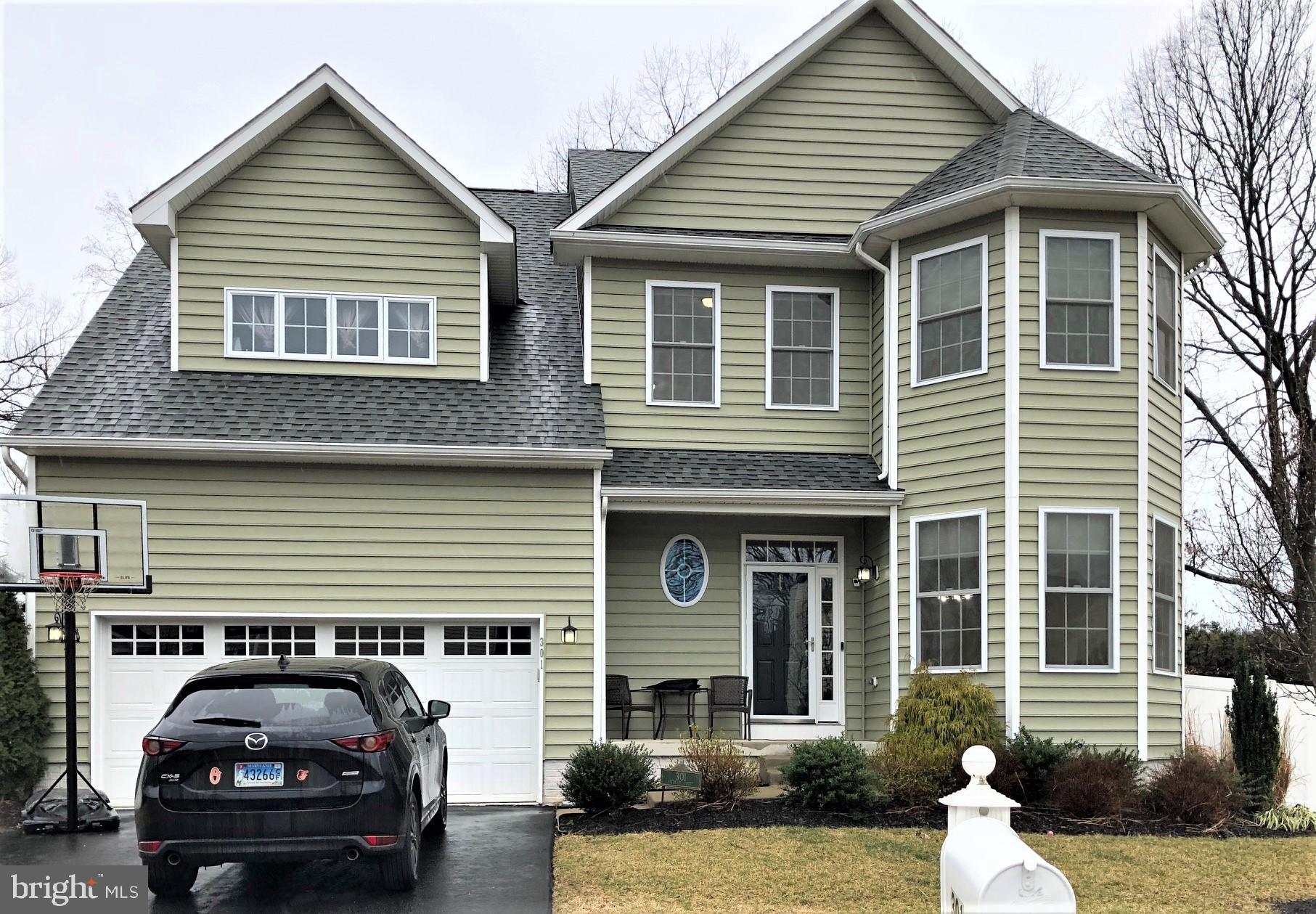 Beautiful Severna Park Colonial. Only 7 years young! Features include: Main Level-42" cherry cabinets, granite counters, stainless appliances, pantry, huge granite center island+dining area! Large Family off the Kitchen with gas fireplace. Foyer open to formal dining/living area. Beautiful hardwood floors throughout main level with carpeted family room. Upper Level-4 bedrooms to include huge master with sitting area, walk-in-closet and super bath, 3 additional spacious bedrooms+laundry room with utility sink. Lower Level-Finished family room, finished recreational area, new full bath, new carpet, and exterior door to the back yard. Exterior- Large corner lot on just over 1/3 acre, 6'private vinyl privacy fence , beautiful 15 x 15 trex /vinyl decking, 12 x 18 paver patio and 8 x 12 vinyl storage shed. Also: Zoned heat and air, Natural Gas heat on main level and finished basement, heat pump on upper level. freshly painted on Main Level and basement, and 2 car garage with 2 - 4x8 safe racks in ceiling for additional storage.