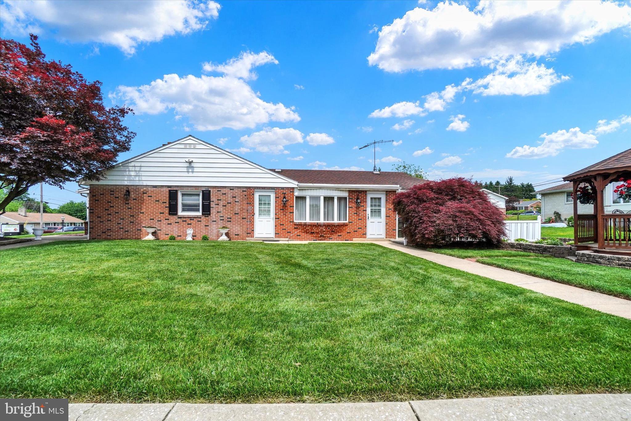 Welcome to 2290 School Street, York, PA 17408 – a unique and spacious ranch-style home in the heart of Shiloh and West York Schools! This sprawling home offers incredible potential with 3 designated bedrooms and the opportunity to create up to 5 total bedrooms. Thoughtfully designed for accessibility, the layout includes wide halls and entrances, making it ideal for multigenerational living or future in-law quarters. Inside, enjoy the warmth of both a gas fireplace and a cozy wood-burning fireplace. The expansive great room offers endless possibilities—perfect as a game room, home theater, or even a future garage conversion. The lower level is partially finished with a large rec room, full bath, and bonus space to personalize for your lifestyle needs. Outside, you'll find two storage sheds, a charming gazebo, and a flat yard ready for outdoor entertaining. Conveniently located just off Route 74 with easy access to shopping, dining, and local amenities, this one-of-a-kind home offers space, flexibility, and opportunity—don’t miss your chance to make it yours!