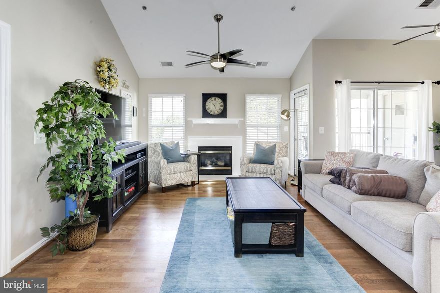 Stunning, luxurious, huge & light filled 2 level penthouse condo featuring 3 bedrooms, 3 full bathrooms, 2 fireplaces & a private garage with driveway in the heart of Fairfax!  Kitchen features stainless steel appliances, granite countertops & breakfast bar.  Vaulted ceilings make this home feel like a palace!  Spacious living room with fireplace and balcony.  Separate dining room with 2nd fireplace.  Primary bedroom & 2nd bedroom on main level, and walk upstairs to your own private office/den/family room/3rd bedroom with full bathroom.  Private garage, driveway, and passes to park up to 2 more cars means you can have up to 4 cars parked.  Secured entry to building, walk to Wegmans, minutes to all major commuting routes, community pool, tennis courts, basketball court, tot lots, and more!  Don't be mistaken, this is the NICEST condo you will ever see!!!