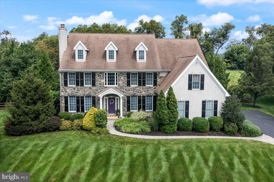 This impressive property offers a perfect blend of elegance, comfort, & tranquility. Nestled in the established and serene community of Osborne Place, this home is close to the award-winning Unionville-Chadds Ford schools, shopping, and major arteries, yet set in a pastoral setting with rolling hills.  

From the moment you approach this stone colonial, the attention to detail is evident. The extensive stone façade is complimented by handsome landscaping. As you approach the home on the custom paver walkway, the main entry greets you with an open and spacious foyer.  The site-finished hardwood floors, wainscotting, appealing décor, and ample sunlight (southern exposure) provides a warm and inviting feel.  Hardwood floors extend throughout most of the 1st floor including the adjacent Dining Room with tray ceiling and ornate molding and trimwork. The opposite side of foyer opens to the gorgeous Living Room with custom built-in shelving and central fireplace with impressive cultured mantel.  Continue toward the rear of the home to the first floor office (with full glass door and matching transom) and generously sized grand Family Room with vaulted ceiling, arched windows, and an additional fireplace (also with an impressive cultured mantel).

Open floorplan is perfect for entertaining as the Family Room flows nicely into the adjoining Kitchen.  Ample and oversized windows further extend the open feel of this home.  The Kitchen is beautifully appointed with white cabinets, dark granite counters, and complementary slate blue island. Copious cabinets turn the corner to the Dining Room and incorporate a separate wet bar with access to the secondary staircase.  Rounding out the first floor are the powder room, the tiled mudroom (with built-in cubbies), and generously sized 3-car garage.

Ascend the staircase to the 2nd floor which offers access to each of the 5 bedrooms. Each bedroom is nicely sized and tastefully decorated.  With three full bathrooms (including one jack-and-jill serving two of the bedrooms), there will be no waiting to take a shower!  The main bedroom suite is also handsomely decorated & complete with tray ceiling, adjacent sitting area, ample walk-in closet space (with custom closet organizers), and exceptional five-piece tiled bath. 

The finished lower level provides even further entertainment opportunity with its open recreation room, adjoining craft room, and additional full bath.  

Speaking of entertaining, the centerpiece of this fantastic property is the expansive back yard!   Paver patio provides access to the spacious flagstone patio surrounding the gunite in-ground pool with stone backdrop and included waterfall!  Your own private oasis!  Flagstone patio extends to the adjacent pergola and adjoining cozy firepit!  There’s also a large, level portion of the yard available for yard games.

Set your appointment today!  This home will not disappoint!