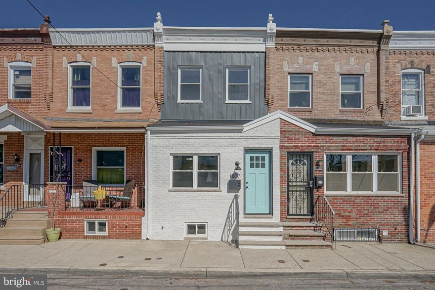 Come check out this gorgeous fully renovated 3 bedroom, 1 bath home.  When you enter into the home, you are greeted by gorgeous modern hardwood floors throughout the first floor, leading into the modern renovated kitchen with grey and white cabinets, stainless steel appliances, and gorgeous grey subway tile. The kitchen also has a door that leads to the back patio which is the perfect outdoor space for entertaining. Inside, there is a modern wood accent wall leading down to the basement, for an additional entertaining space.  Upstairs you'll find a gorgeous staircase leading to the 3 bedrooms, and 1 bath. All 3 bedrooms feature beautiful hardwood floors, and fresh paint. The bathroom, is modern and bright, with sparkling white cabinets, and tub, and gorgeous white and grey veined tile. Don't miss this opportunity! Close to all transportation, restaurants, and shops!