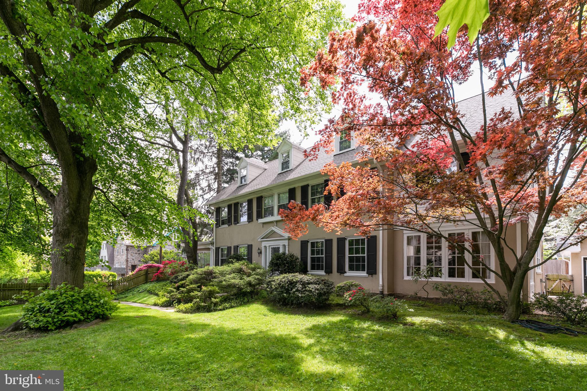 Welcome to a beautiful 6 bedroom 4 ½ bath 1900 colonial with original details AND modern amenities - - a brand new kitchen, a primary suite, 2 car garage, tons of storage, a powder room, a mud room and laundry room right off the kitchen. There are original hardwood floors throughout.
Enter a gracious, front to back center hall, perfect for welcoming guests. On either side of the center hall are a living room with wood burning fireplace and a formal dining room. The kitchen has plenty of work space, a gas stove, Bosch dishwasher and a pantry. On the first floor, there are two bright sun rooms with so many uses - - library, music room, office, family room. Upstairs is the primary suite complete with a walk in closet and a bath with 2 sinks, tub and shower. There is an en suite bedroom and 2 other bedrooms with a hall bath on this level. On the third floor are two large bedrooms with a jack and jill bath. There is a finished family room on the lower level perfect for play space or gym equipment. Store all of your Costco items and luggage in a very large unfinished storage room with shelving. The detached 2 car garage includes a crawl space with additional storage.
The homeowners have lovingly maintained this home for 26 years and raised 5 children here. The home is set on a generous lot on a quiet street; there is a patio, grassy space and a new wood fence. The roof and gutter system is BRAND NEW and comes with warranty. The mechanical systems have been updated. There are new storm windows throughout the home. There is even an alarm system and a generator. The prime Bala Cynwyd location is a very short commute to hospitals and Center City. This home is located in the renowned Lower Merion school district. Walk to train station, houses of worship, elementary and middle school, walking and biking trails, the Cynwyd Club for pool and tennis, Starbuck’s and shopping. Low taxes.