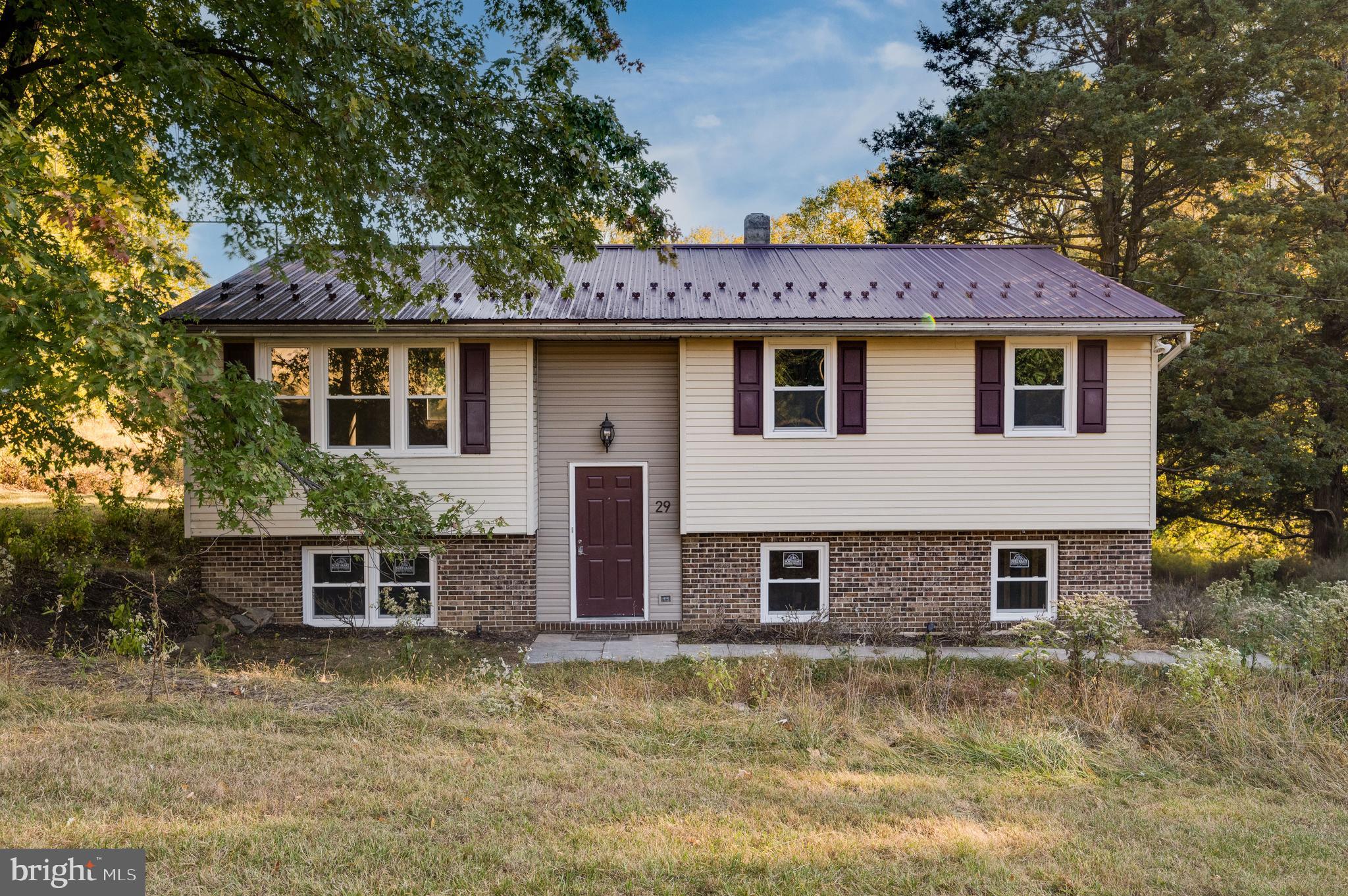 Welcome to 29 Wolters Ln! Escape to your own secluded paradise with this beautiful fully detached 3-bedroom home that sits on over 3 acres of land. This move in ready home sits beautifully reserved while at the same time still being located near major highways, schools, and shopping. Making it feel like your own private oasis. The modern updates, private parking, and tranquility abound in this stunning property and are only a few of the many things it has to offer. Schedule your viewing today and make this dream home yours!