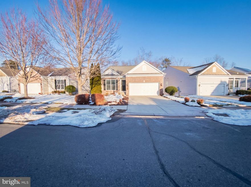 55+ Adult Community. Welcome to 101 Denison St, a home that exudes warmth and sophistication. The living room is graced with a cozy fireplace, perfect for those chilly evenings. The kitchen is a chef's dream, boasting all stainless steel appliances and an accent backsplash that adds a touch of elegance. The primary bedroom is a true retreat, featuring a spacious walk-in closet. The primary bathroom is designed for relaxation, complete with double sinks for your convenience. Step outside to a deck, ideal for entertaining or simply enjoying a quiet morning coffee. The home has been recently updated with fresh interior paint, giving it a clean and modern feel. Experience the perfect blend of comfort and style in this home!. Included 100-Day Home Warranty with buyer activation