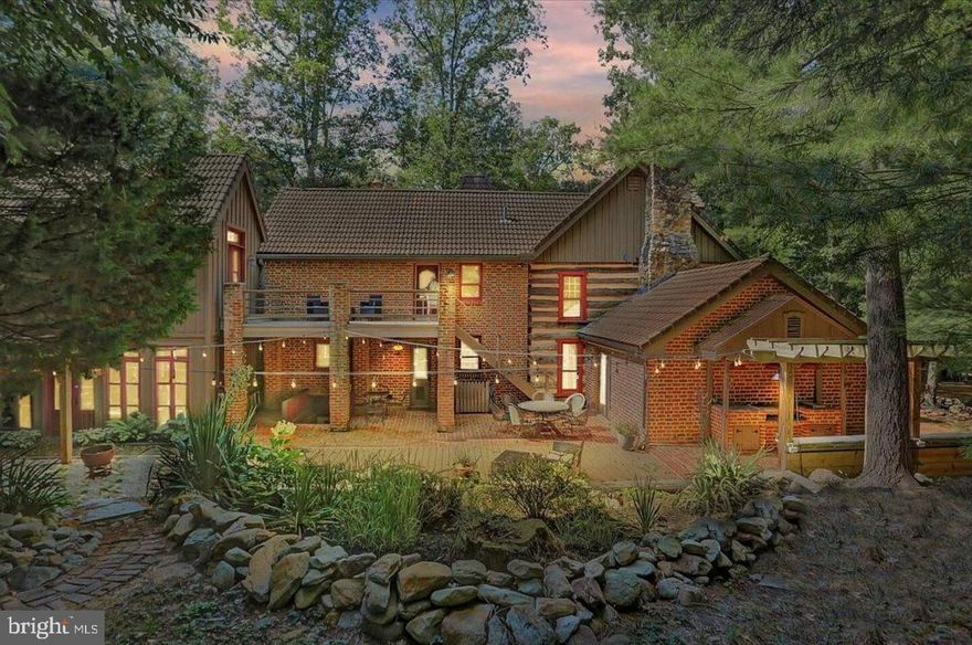 Discover an enchanting retreat nestled within 16+/- acres of Pennsylvania woodlands at 995 Black Gap Road. This beautiful, custom-built home, crafted with reclaimed materials, brings timeless character together with thoughtful, modern upgrades. Built in 1987 and thoughtfully expanded in 2000, with upgrades in 2023, this home offers vast living spaces, perfect for both relaxation and entertaining. Step inside and be greeted by a warm, inviting atmosphere where exposed beams, brick accents, and seven unique fireplaces create a setting that feels both grand and intimate. 
 
The heart of the home is a gourmet kitchen, equipped with soapstone countertops, a high-end ILVE range, and stainless steel appliances. It flows effortlessly into a family room with one of the home’s many fireplaces, creating the ideal gathering space. The dining room, with its atrium-inspired design, invites sunlight and showcases stunning views of the natural surroundings. Each of the five bedrooms presents its own character, from vaulted ceilings and wood beams to cozy fireplaces and private balconies, offering serene spaces to unwind. 
 
The finished basement provides entertainment on another level, featuring a movie theater area, game room, and additional storage. Outside, you’ll find numerous spaces for gathering, from a pergola-shaded patio to a brick walkway leading to an outdoor fireplace, all enhancing the property’s appeal for hosting or quiet reflection.  
 
With a proven record of Airbnb success and used as the occasional wedding venue, this property not only serves as a peaceful residence but also offers an attractive investment opportunity. Whether you are looking to expand on your real estate investment portfolio or have your very own private home, this property comes fully furnished, is turn-key and ready to use! 
 
 Additional features include a detached garage - shop, a spacious outbuilding perfect for projects or storage, and a newly installed outdoor wood-burning stove with dedicated wood storage. Timber value has been estimated to value roughly $20,000 for a select cut to include clearing around the house if desired a more open landscape. This property is truly a rare gem for those seeking a home rich in charm, character, and uniqueness.