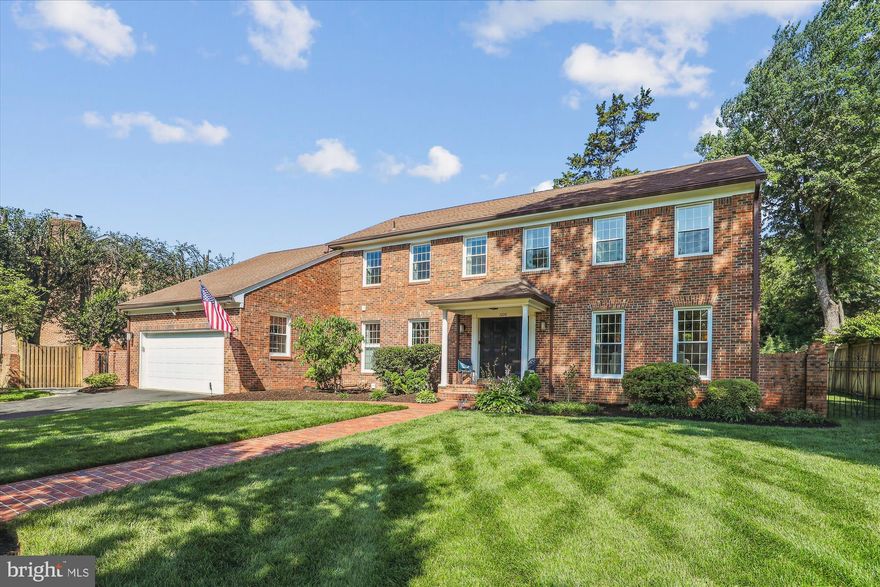 Welcome to 1200 North Gaillard Street – a classic colonial located in the Vauxcleuse neighborhood. Discover your dream home on a rare, flat half-acre lot that offers endless possibilities for outdoor living and entertainment.

Step through the grand entrance hall into a home designed for both daily comfort and
sophisticated entertaining. Gleaming hardwood floors flow seamlessly throughout, connecting
each thoughtfully designed space. The sun-drenched living room features exquisite crown
molding, while the adjacent dining room adds drama with custom wainscoting. The sunny
kitchen boasts a center island and breakfast area, flowing into a cozy family room with
gas fireplace. A private home office, updated laundry room with new appliances, and large
powder room complete the main level.

Four generously sized, light-filled bedrooms occupy the upper level, all featuring rich hardwood
floors. The expansive primary suite serves as your personal sanctuary with luxurious ensuite
bathroom and walk-in closet. Three additional bedrooms offer excellent closet space and share a well-appointed hall bathroom.

The finished lower level boasts impressive 9-foot ceilings with limitless potential—transform it
into a media room, home gym, or entertainment space, plus there is the third full bathroom.

Step outside to your fully fenced backyard oasis. The expansive brick patio features a stunning
wood-burning fireplace and built-in grill—perfect for hosting memorable gatherings. The lush,
level lawn provides endless possibilities: croquet, bocce ball, children’s playground, or serene
relaxation. A fully powered outdoor shed offers versatile storage for garden tools, workshop
space, or seasonal items.

This rare combination of elegant interior finishes, premium lot, and outdoor paradise creates theperfect backdrop for lasting memories.

Your forever home awaits.