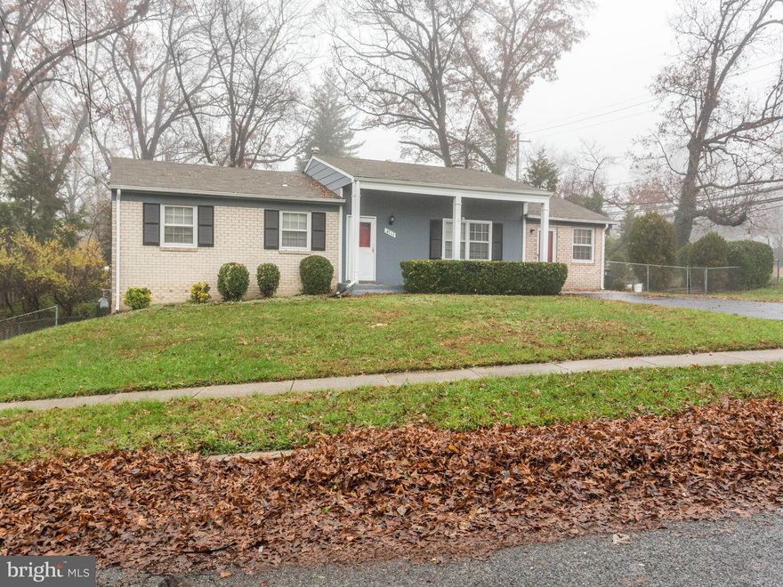 Lovely sunny home situated on quiet tree lined street. Generous sized rooms. Gleaming hard wood floors. Fresh paint inside and out. Large walk out  basement with bedroom and full bathroom. Huge and well manicured yard yard .Move-in ready. Wonderful location .