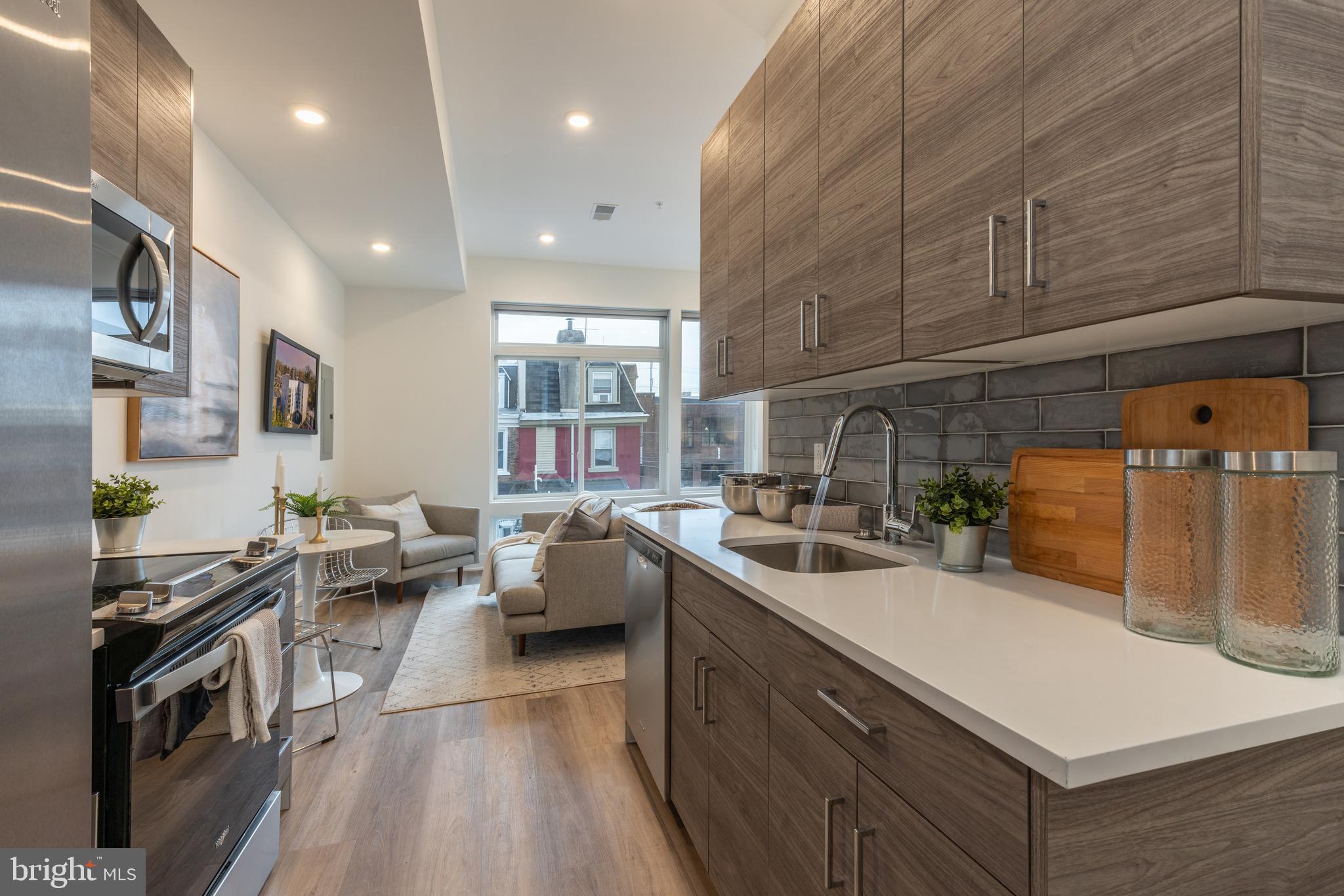 Welcome to The Nook! This 34-unit community is located in Germantown, one of Philadelphia’s most historic neighborhoods that also allows for easy access to City Line Avenue, Manayunk/Roxborough, Kelly Drive, and Center City.
Residents at The Nook will enjoy an abundance of amenities including smart home keyless entry systems, a fully furnished shared rooftop deck, and a fitness center that is equipped with top-of-the-line gym equipment. There is an on-site package center which will allow for simple order delivery and return services, as well as limited off street garage parking available to residents. Each unit is highlighted by sleek white countertops, modern shaker cabinetry, high end Whirlpool stainless appliances, custom California styled built out closets, and tons of natural lighting from the massive windows throughout.
Location is everything, and The Nook does not disappoint. One block away from Chelten Ave, enjoy seamless access to the Chelten Ave Septa Station, Germantown Ave, and I-76, simplifying your daily commute to Center City and beyond. Plus, with essential amenities such as a grocery stores, coffee shops and gym clubs just steps away, everything you need is within reach.
For those who crave outdoor adventure, the scenic Wissahickon Valley Park beckons with its picturesque trails, perfect for walking, running, and biking - all within easy reach of your new home at The Nook.
LEASING PROMOTION: Approved prospects will only be required to pay 2 months rent (first + security) to move in.