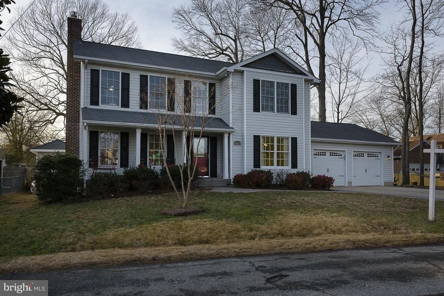 Stunning colonial with water views in Mimosa Cove, a private waterfront community, boat ramp access to the Bay. Custom moldings, HW floors, gas fireplace and fresh paint. Chef s kitchen with 7  granite island & countertops. Maple cabinets, Wolf range, GE Monogram refrigerator. Newly appointed bathrooms with soaker tubs. Sunroom leads to paver patio, Professionally landscaped and hardscaped.