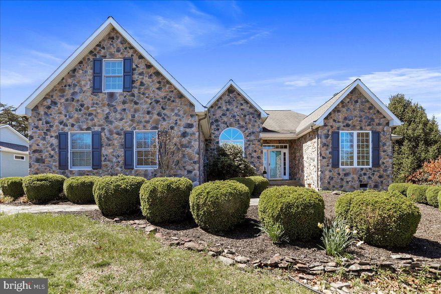 Refined Living with Golf Course & Water Views
Beautifully situated along the 12th and 15th fairways with tranquil water views, this impeccably maintained home offers a rare blend of comfort, style, and space. Thoughtfully upgraded and move-in ready, the home boasts a gracious layout with exceptional outdoor living, high-end
Step through the front door—framed by sidelights and a transom window—into an elegant open floor plan with soaring ceilings, warm hardwood flooring, and abundant natural light. To the left, the formal dining room sets the tone with its timeless crown molding, flowing into a vaulted living/great room anchored by a stunning gas fireplace with a two-story stone façade, wood mantel, and stone hearth. Custom built-in cabinetry flanks both sides, while a Bose sound system enhances the ambiance. Expansive windows frame breathtaking views of the golf course and water beyond.
At the heart of the home is a beautifully designed, light-filled kitchen featuring custom cabinetry, granite countertops, a center island, recessed lighting, and a pantry-offering exceptional storage and prep space. Whether you're a seasoned home chef or simply love to entertain, this kitchen delivers the form and function that culinary aficionados appreciate. The adjoining breakfast area features charming wainscoting and overlooks the mature landscaping, adding a serene touch to your morning routine.
The adjacent 3-season room extends your living space, offering the perfect place to unwind or host guests in any season. Step outside onto the large deck with vinyl railings and take in the peaceful setting. A Sunsetter retractable awning provides instant shade and comfort, making outdoor living enjoyable any time of day.
With four bedrooms plus a fifth currently configured as a home office, there's space for everyone and everything. Each bedroom features ceiling fans and 9-foot ceilings, adding comfort and spaciousness throughout. The private primary suite is a true retreat, with French door access to the 3-season room, two walk-in closets, and a large bath with double sinks, a linen closet, and a private water closet.
Custom draperies add a refined touch in the breakfast area, living and dining rooms, guest suites, and the office/den-elevating the feel of each space with thoughtful design.
A standout feature is the spacious FROG (Family Room Over Garage)-ideal for a media room, guest overflow, craft space, or the ultimate playroom. Let your imagination decide.

This property includes a Class A membership to The Woods Club, transferable with a one-time initiation fee of $3,150. Annual dues of $2,600 grant access to a wide range of premium amenities including two golf courses, indoor and outdoor swimming pools, a fitness center, tennis and pickleball courts, clubhouse dining, and more.
This home is more than well-kept-it's well-loved and ready to welcome its next chapter.