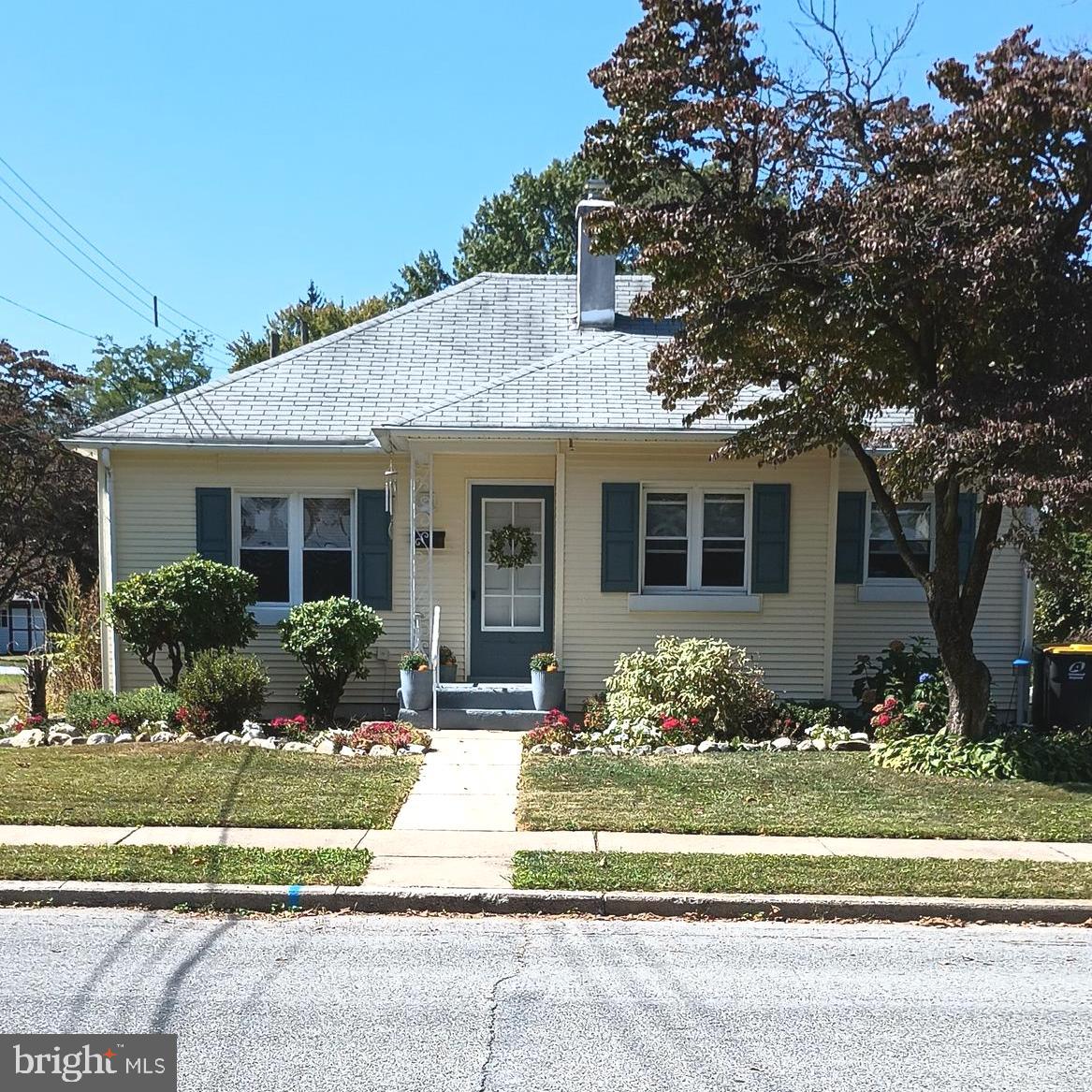 Bigger than it looks! This quiet neighborhood features a well kept home full of character and a welcoming country feel. Offering primarily one floor living, this home features an eat-in kitchen with generous cabinet space and hardwood floors throughout much of the home. The partially finished basement with a full bath provides flexible having two separate rooms divided by French doors. Perhaps a private office or game room. Newer hot water heater less than a year old. The property also offers a 2 car detached garage and generous off-street parking for 3+ vehicles. Schedule your private showing today.