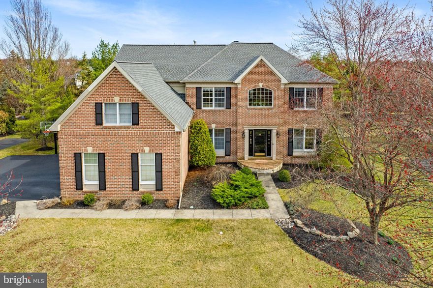 Come check out this stunning new listing in the gated blue bell Country Club community that offers an inviting blend of modern elegance and casual comfort. 4 bedrooms, 3 full baths, and 1 half bath, located on an amazing lot in the desirable Willowbend Village, this home is designed for those who appreciate quality and style. Step through the two-story foyer and be greeted by gleaming hardwood floors that flow through the living room and dining room. The living room features a built-in bar with a custom backsplash, perfect for entertaining. The heart of the home is the updated kitchen, complete with granite countertops, stainless steel appliances, plenty of cabinet space, a pantry and a spacious island. There's even a cozy spot for your breakfast table and a french door to lead you outside to the amazing private yard. Seamlessly connected to the gourmet kitchen is a two-story great room that is bathed in natural light, with its floor-to-ceiling windows covered in shutters and not to be missed is a charming wood-burning fireplace. Off the family room is an additional room that makes a great office for those that need it! Rounding out the first floor is the powder room, laundry room and access to the attached three car garage.  Upstairs, enter double doors into the expansive primary bedroom that is a true retreat, offering a cathedral ceiling, two custom walk-in closets and a luxurious bathroom completely renovated with marble flooring, a large walk in tiled shower stall,  and double vanity. Three other nicely sized bedrooms and full updated hall bathroom with a tub shower complete the upstairs. Head down to the finished basement where you will find more space for entertaining along with a bonus room ideal for an extra bedroom or office plus a full bathroom and plenty of storage space. Outback, enjoy the newer bluestone paver patio, complete with a built-in grill and fire pit, both connected to a gas line and offering privacy with the beautiful landscaped grounds. The community center, one of the benefits of living in the Country Club community, is a short walking distance from the house and provides home owners with multiple pools, tennis courts, pickle ball courts, playground and gym. Also conveniently located near public transportation, excellent restaurants and shopping as well as being located in the highly rated Wissahickon school district. Schedule your tour today!! Be the lucky next homeowner of this fantastic house!!