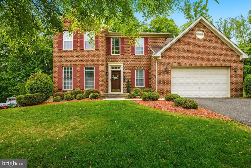 Welcome to 6707 Stoneridge Court, a spacious Fort Washington colonial offering the room, layout, and setting today’s buyers are looking for. Set on a generous 0.46-acre lot backing to trees, this home delivers privacy, usable living space, and convenience just outside Washington, DC. Inside, a two-story foyer opens to a comfortable floor plan with wood floors, crown molding, formal living and dining areas, and a family room with a fireplace located just off the kitchen. The kitchen features an island, table space, gas cooking, a built-in microwave, a dishwasher, a refrigerator, and direct access to the rear deck—ideal for everyday living and easy indoor/outdoor flow.

Upstairs, you’ll find four bedrooms, including a spacious owner’s suite with a sitting area, a walk-in closet, a tray ceiling, and a large bath with a soaking tub and a separate shower. The finished walkout basement adds flexible space for recreation, work, guests, fitness, media, or additional storage, with a full bath and walk-up access to the side yard. Additional features include a 2-car attached garage, driveway parking, central air, natural gas heat, public water, public sewer, and a low quarterly HOA fee.
