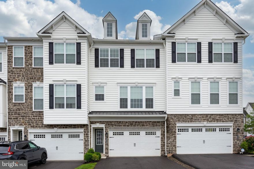 ***All interested parties can attend the Open House on Saturday June 21 from 11-2, check listing to make sure it is still available before attending on Saturday***. Welcome to 228 Cadence Court – a beautifully appointed 3-bedroom, 2.5-bath luxury townhome in the desirable Courts at Brynwood community in Collegeville.

Situated on a picturesque street with charming views of the community gazebo and play area, this nearly new home offers the perfect blend of style, comfort, and modern functionality. Thoughtfully designed and impeccably maintained, it features premium finishes and a layout that adapts easily to your lifestyle.

The entry-level offers a spacious, finished flex space with a walkout paver patio—ideal for a home office, playroom, gym, or additional living area. Upstairs, the main level showcases an open-concept floor plan with luxury plank flooring, upgraded cabinetry, and elegant quartz countertops. A generous 8-foot island anchors the kitchen, providing ample space for both meal prep and entertaining. High-end stainless steel appliances include a refrigerator with dual drawers and a premium electric cooktop with a fast-boil burner.  Just off the dining area is a private Trex deck with peaceful, unobstructed views of open green space.  This space is the perfect place to enjoy your morning coffee or break out the grill for those summer BBQ's.

Upstairs, the primary suite features a large walk-in closet and a beautifully upgraded en-suite bath with a dual vanity, expansive counter space, and a glass-enclosed shower with a built-in bench. Two additional bright, spacious bedrooms enjoy views of the park-like community open space and are serviced by a stylish hall bath. A full laundry room adds extra convenience on this level.

The two-car garage includes a universal EV charger, two overhead steel shelves, tool organizers, and a dedicated storage area—making organization effortless. Additional guest parking is conveniently located just across the street.

Located in the award-winning Methacton School District and just minutes from Providence Town Center, grocery stores, shopping, restaurants, and recreation—including the Perkiomen Trail and Evansburg State Park—this home offers easy access to Rt. 422, Rt. 202, the PA Turnpike, and major commuter lines.

Don’t miss your opportunity to enjoy low-maintenance luxury living in one of Collegeville’s most sought-after communities. Schedule your tour today!