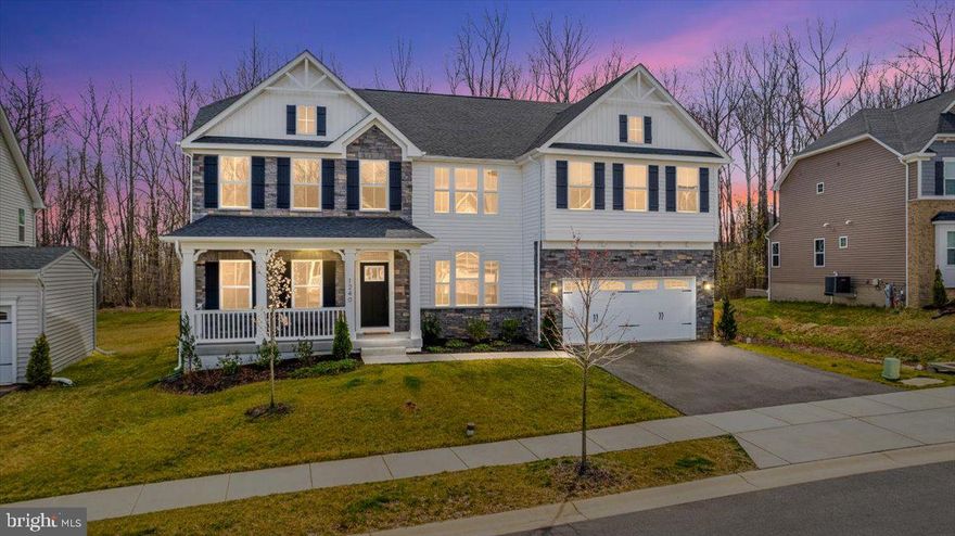 Stunning Colonial With Amazing Upgrades Now Available in the Coveted Community of Two Rivers! No construction waiting lists or delays-this home was completed in 2021 and is ready for its new owners! Upon entry you will notice the impressive two-story foyer and beautifully upgraded balusters and oak stairs. Head to the picturesque gourmet kitchen which features quartz counters, double wall ovens, a gas cooktop, and a massive island! Upstairs boasts a flexible loft area with 4 spacious bedrooms and 2 full bathrooms. At the end of a long day retreat to your massive primary bedroom with a luxurious en suite bath and 2 large closets. The abundance of living space is evident throughout the home including the fully finished basement with a bedroom, full bath, and optionally finished media room! All of the best upgrades and features were selected when building this home including a premium lot, upgraded elevation, optional office with french doors, gourmet kitchen, luxury bathrooms,  and so much more!  Welcome home to the life of luxury you deserve! The incredible Two Rivers Community has countless amenities including a pool, indoor basketball court, fitness center, community center, dog park, lake, multiple tot lots, and so much more!   Potentially assumable loan at a 2.25% interest rate! Check out the interactive virtual tour!