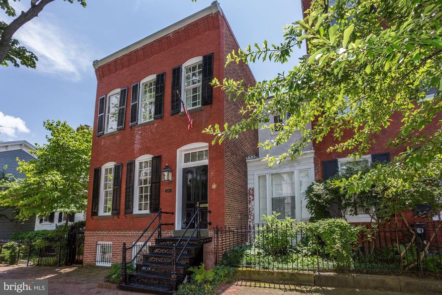 Ideally located in Georgetown's coveted West Village this semi-detached brick home built in 1865, remodeled and expanded in 2012 features 3 bedrooms, 3 full bathrooms and one powder room, living and dining rooms, a family room with 19ft high ceilings, a private brick patio and outdoor swimming pool. Recently updated with new interior style, redesigned lower level, and many system upgrades.