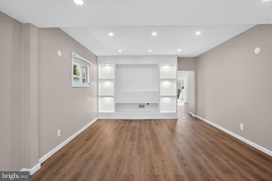 Welcome to this fully renovated three-level home featuring 6 bedrooms, 3 full baths, and a private driveway.
Thoughtfully upgraded throughout, this home showcases luxury vinyl tile (LVT) flooring, fresh paint, and a fully finished basement. The main level offers two spacious bedrooms, a beautifully renovated full bathroom, and a stunning, fully updated kitchen complete with brand-new stainless steel appliances, modern cabinetry, quartz countertops, and recessed lighting. A separate dining room leads to the deck and backyard—perfect for entertaining and everyday living.
Upstairs, you’ll find two additional bedrooms, a fully renovated bathroom, a convenient laundry area with washer and dryer, and a spacious walk-in closet providing ample storage.
The fully finished lower level features a generous recreation area, a renovated full bathroom, and two versatile rooms ideal for use as guest bedrooms, a home office, gym, or den.
Major upgrades include a new roof, siding, front steps, hot water heater, furnace, kitchen, and updated lighting throughout every level—offering both peace of mind and modern comfort.
Ideally located just minutes from Washington, D.C., with easy access to major highways, Metro, shopping, and dining.
Don’t miss this incredible opportunity to own a move-in-ready home in a prime location! Property is being sold strictly as-is.