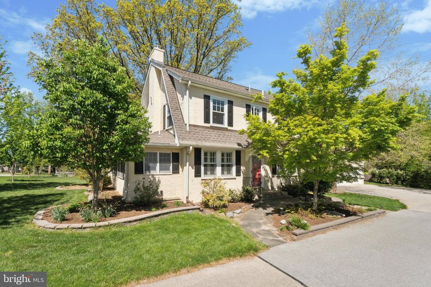 Step into timeless charm and modern convenience at 12 E Central Avenue, a picture-perfect Dutch Colonial nestled in the heart of Paoli.

Located in the highly sought-after Tredyffrin-Easttown School District and just a short stroll from the Paoli train station, Wawa, and the post office, this classic home combines timeless character with everyday convenience.

A lovely slate walkway leads to the cheerful red front door, setting the tone for the warmth inside. Step into the spacious living room, where elegant hardwood floors flow throughout the main level. The focal point is a cozy fireplace featuring a Vermont Castings wood-burning insert, flanked by French doors that open to a sunroom—currently used as a home office—with a convenient powder room. From here, sliding glass doors lead to a private side deck, perfect for relaxing or entertaining.

The formal dining room connects seamlessly to the kitchen, which boasts crisp white cabinetry, striking Ubatuba granite countertops, a tile backsplash, and a pantry closet. A built-in breakfast nook with a custom table and benches adds a charming, functional touch. Off the kitchen, step onto a spacious back deck complete with a framed canopy—ideal for al fresco dining.

Downstairs, the finished basement offers versatile living space with easy-care ceramic tile flooring—ideal for a media room, playroom, or additional office. A full bath with a stall shower adds convenience, while an unfinished section provides room for a workshop, storage, and laundry. Steelway walk-up doors offer direct access to the deck, backyard, and detached garage.

Upstairs, you’ll find four bright and airy bedrooms, all with generous closet space, serviced by a beautifully updated hall bath. The bathroom features a tub/shower combo with classic subway tile surround, glass enclosure, vintage-inspired black and white hex tile flooring, a pedestal sink, and dual built-in medicine cabinets.

The unfinished attic is neat, clean, and offers even more storage potential.

Step outside to discover the impressive two-story, two-car detached garage (25’ x 29’), featuring two front-facing doors with electric openers, a rear access door for lawn equipment, and a lighted cupola for added charm. A pull-down staircase provides access to the spacious unfinished second level with electric—perfect for future use or storage.

The landscaped grounds are lovingly maintained, with mature plantings and an added row of trees along the side for enhanced privacy and shade in the years to come.

This standout home is truly a gem—don’t miss your opportunity to make it yours!