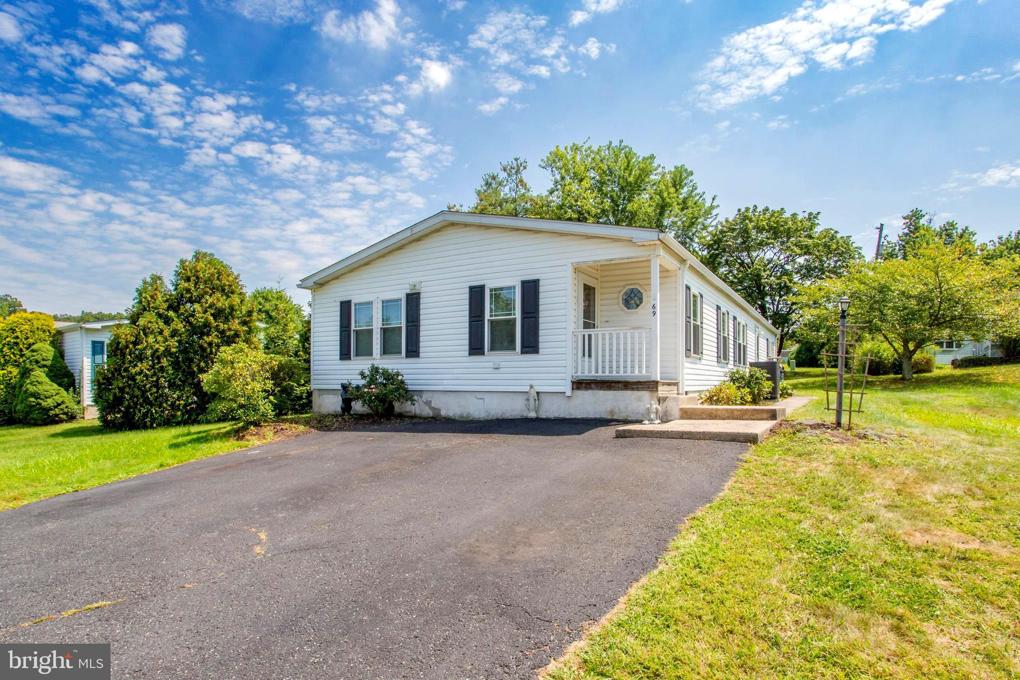 Quiet Acres! One of the Best, Most Desirable 55+ Communities around! This home is located on a quiet street in a community with the nicest neighbors you'll find anywhere. If you buy without a loan, you can OWN it for nearly the same cost as a 2-BR apartment! This 6-room home with 2 Bedrooms, 2 Full Baths, a 17’ x 14’ Large Living Room, and a Formal Dining Room. The large Family Room is 22' x 13'! The Kitchen and Dining area off the kitchen has newer vinyl flooring and a sliding door to a Large covered 21' x 10' Deck. A Bright Kitchen with many Cabinets, and a work Island. Most of the Appliances, Heating/AC, the Roof, and Faucets in the Bathrooms & Kitchen are newer. The Primary Bedroom leads to the Primary Bathroom. The Primary Bathroom has a Walk-In Shower and a Soaking Tub. This well-maintained home has a nice open floor plan. It is not uncommon to see wild turkeys, deer, occasional foxes, and beautiful birds throughout this neighborhood! This Home has many extras and a great location. Quiet Acres Truly IS a Quiet Place and a Great Neighborhood! There is a Wonderful Clubhouse where there are monthly activities such as community Breakfasts, evening events like Monthly meetings, Potluck Dinners, St. Patrick's and Christmas Parties, Bingo nights, Game Nights, Koffee-Klatches, Summer Picnic, and more. There is also an Exercise Room, a Free Library, a Pool Table, and a Dart Board. The Clubhouse is available for rent at a very inexpensive price for personal parties, etc. It is big enough to comfortably handle 50 guests. (My wife and I had our 50th Wedding Anniversary, with a DJ and Catered when we lived there.) Quiet Acres is a peaceful location within 2 miles of Souderton shopping. Home Depot, Giant Market, Staples, PA State Store, 2 Pet Shops, and nearby restaurants. Grandview Hospital is within 3 miles, and numerous Doctors and Dentists are nearby. Or, enjoy a Dinner and a Show at The Washington House Restaurant and Sellersville Theater. If you want to Downsize and live in a Peaceful, Affordable, great 55+ Community, This Is It! VERY Motivated Seller." Will be Vacant as of 8/28/25. Looking for a quick settlement.