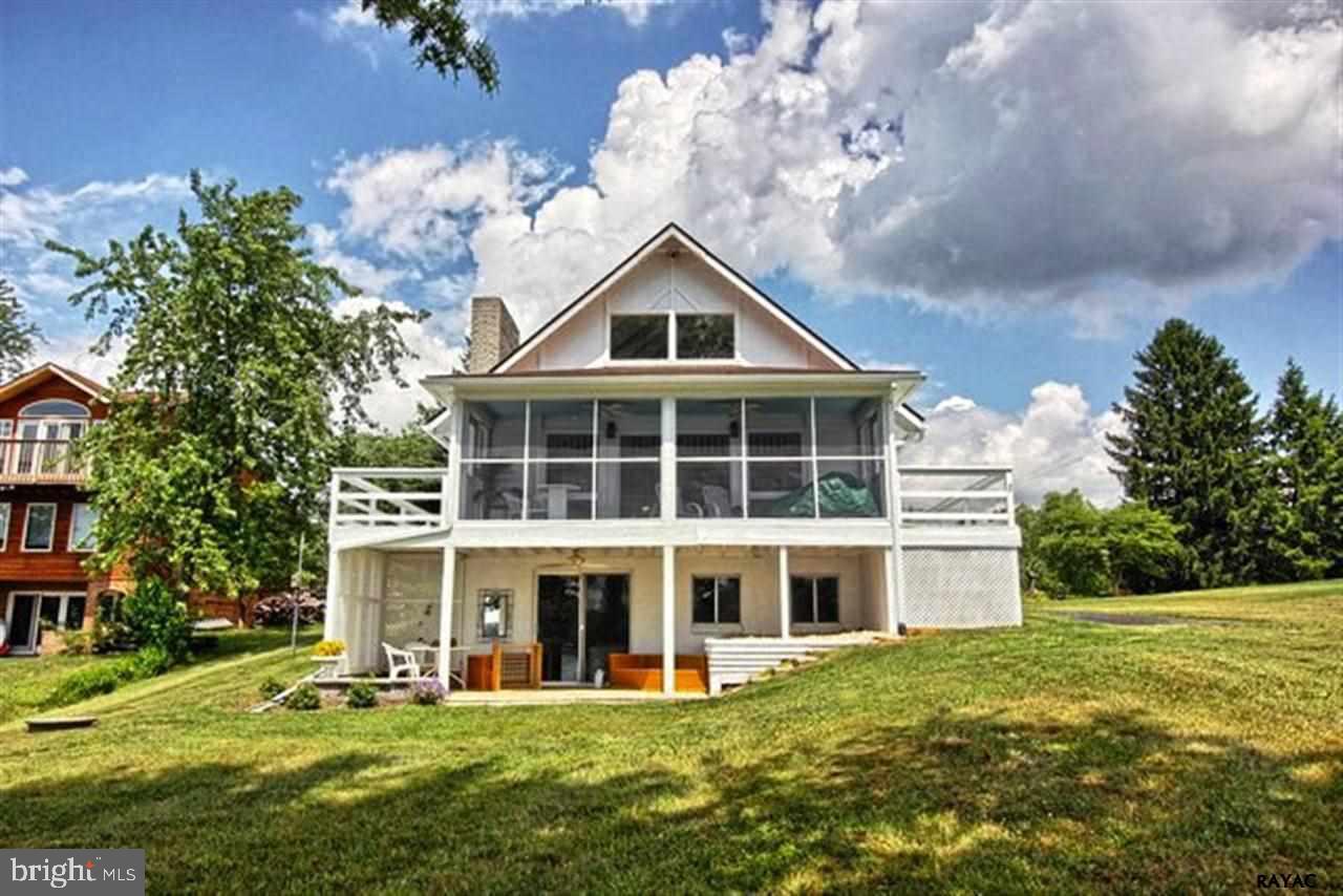 22 X 8 SCREENED IN PORCH, 20 X 20 COMPOSITE BOATDOCK, CONCRETE SEA WALL, WATERFRONT 18 X 11 PATIO, 36 X 24 FRAME 3 BAY DETACHED GARAGE, PELLET STOVE IN GREAT ROOM, INTERIOR HAS BEEN COMPLETELY REMODELED. ENJOY THE OPEN FLOOR PLAN IN THIS WATERFRONT.