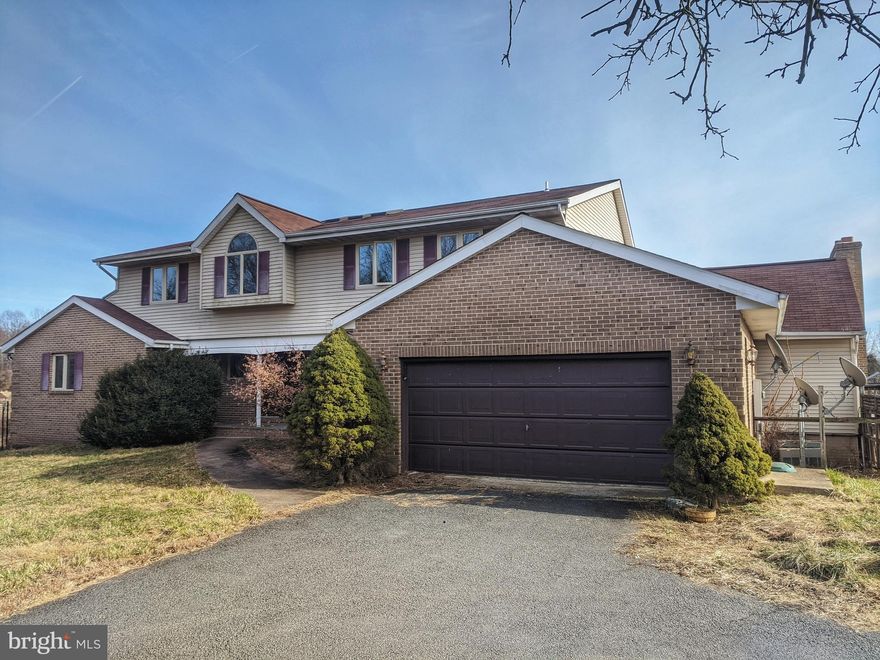 5BR home situated on a private 10+ acre property with a pond!  Beautiful country setting and views, yet just minutes from town amenities.  Property includes a 3-car detached garage and is horse-ready.  House offers main-level living with a master suite on the main level.  Upper level with 3BR, 2FB, and loft area.  Spacious lower level is finished with a rec room w/ wood stove, BR5, den/BR6, and a 2nd kitchen.  Deck in the back overlooks pond and provides gorgeous views.  Some TLC is needed to make this home shine again.  This is a must see!  360 Virtual Tour: https://www.vr-360-tour.com/e/SG0BcT9OUHQ/e?hide_e3play=true&hide_logo=true&hide_nadir=true&hidelive=true