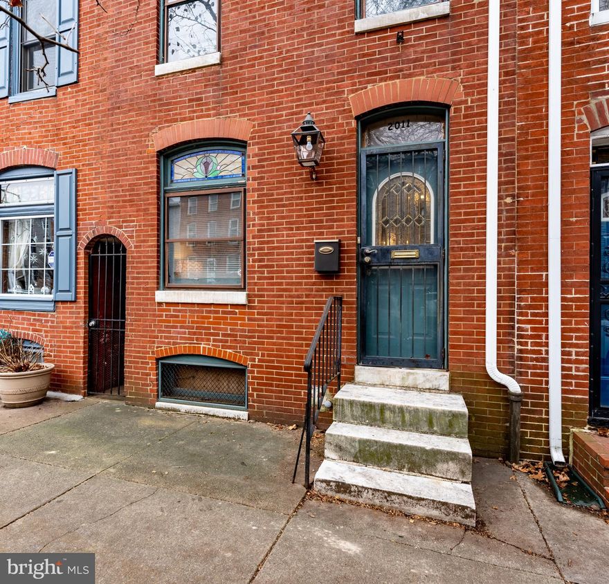 Welcome to this unique and charming Upper Fells Point home. This home boasts three bedrooms each with their own en-suite full bath and there are two additional half baths on the main level. As you enter the living room you are greeted by hardwood floors that flow into the spacious light filled dining room. The kitchen was remodeled (2016) with updated appliances, flooring, backsplash, countertops, and a kitchen Island. At the rear of the home is a mudroom that also acts as a laundry room with a utility sink and half bath. The additional half bath is tucked away under the stairway and was updated in 2016. The second level includes two bedrooms that have hardwood floors, ceiling fans, and each has their own en-suite full bath. The rear bedroom also has a laundry area. The third-floor bedroom has updated flooring (2016), a ceiling fan, walk-in closet, and en-suite bath. Enjoy reading or sipping your morning coffee in the quant rear yard. Seller converted the boiler from oil to gas (2016) and updated the main electrical panel (2016). Conveniently located near Patterson Park and Historic Fells Point. Close Proximity to John Hopkins Hospital, Harbor East, and Downtown Baltimore. Seller prefers to sell property As-Is but buyers are welcome to conduct inspections for informational purposes