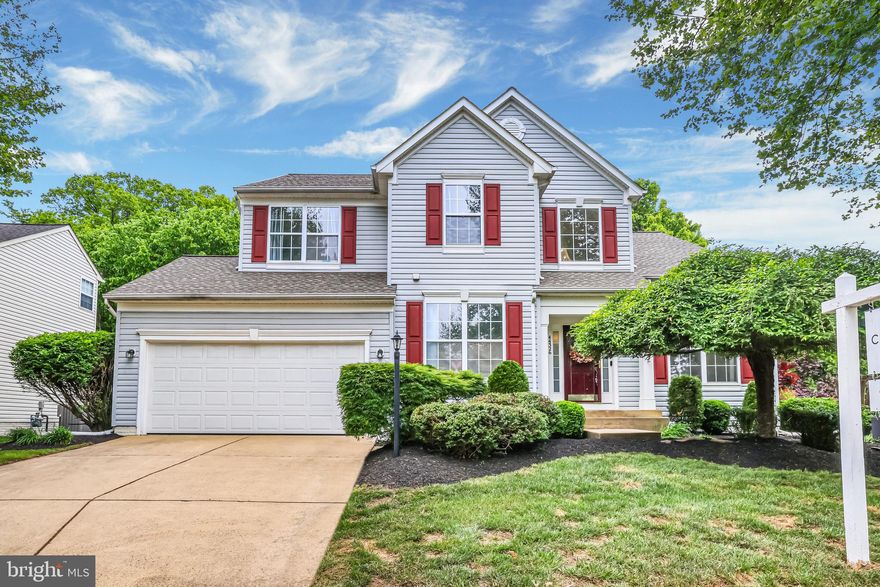 This refreshed Ashburn Village residence radiates modern sophistication with extensive updates throughout. The main level features a two-level foyer and polished hardwoods that lead to a fully updated kitchen now boasting sleek quartz countertops. Relax in the elegant formal living room or the family room with its cozy gas fireplace, while the private office with French doors provides a quiet workspace. Upstairs, the primary suite impresses with cathedral ceilings and a newly renovated, luxurious en suite bath. The finished walk-up lower level offers a versatile recreation room with brand-new flooring and a full bath. Residents enjoy access to premier community amenities, including the Sportsplex, pools, and scenic trails, making this updated home completely move-in ready