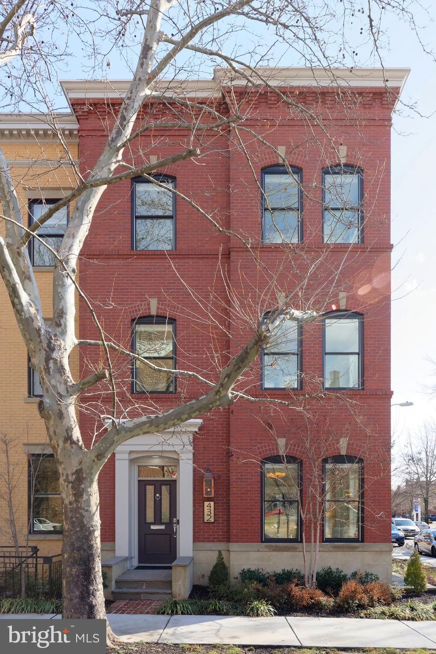 A pristine beauty, this exquisitely-done, prime corner townhouse sits distinctly amid a boutique collection of six newly-constructed homes in Old town, known as a coveted Wilkes Row.  The luxurious contemporary home with 4 bedrooms and 4 1/2 baths is brimming with high=end finished, EnergyStar efficient, and perfect for entertaining with a gracious open-concept layout for living and dining.  All new Pella windows positioned on 3 sides of the residence invite in lovely natural light throughout the day.  Stunning 6" wide plank, light stained hardwood floors and sleek moldings enhance the classic yet modern ambiance.  The stylish open gourmet kitchen is well appointed for the chef with white cabinetry, quartz counter tops, a glass backslash, and Thermador stainless steel appliances.  Other highlights include a lower level rec room/guest suite with a kitchenette, full bath and separate entrance, a sound system and detached 2-car garage featuring a Tek system for handing bicycles and other storage.  Enjoy the privacy of barbecuing and relaxing outdoors in the rear fenced yard with a brick patio and garden area.