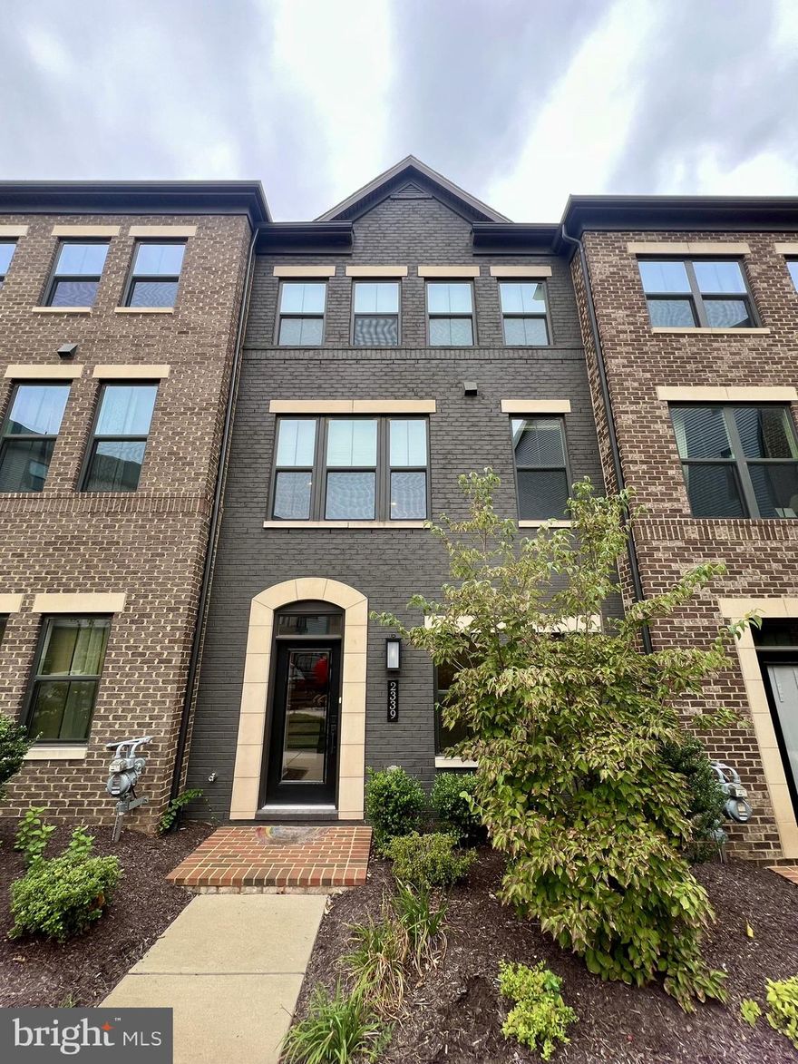 Vacant for immediate occupancy! Welcome to this sophisticated brick-front four-level townhome, which offers a well-crafted blend of comfort, style, and convenience in one of Herndon’s most desirable communities. Built in 2020 and located just four minutes’ drive from the Herndon Metro Station, this residence is ideally situated near Reston Town Center, the Village Center at Dulles, the scenic W&OD Trail, and Dulles International Airport, with effortless access to major commuter routes including Route 28, Route 50, Fairfax County Parkway, and the Dulles Toll Road.

This spacious townhome offers 2,401 square feet of bright and welcoming living space over four above-ground levels with 3 bedrooms, 3 full bathrooms, and 2 half baths. And it features rear two-car garage, roof-top balcony, open floor plan, high ceilings, recessed lighting, and hardwood floors throughout the four levels. The entry level offers a spacious family room, with easy access from either the front entrance or the attached two-car garage. On the first upper main level, you'll find an open floor plan that's perfect for relaxing or hosting friends. The chef’s kitchen features oversized island, white cabinets, quartz countertops & backsplash, stainless steel appliances, gas cooktop, & wall oven with microwave. Dining room and living room on either side of the kitchen. There's also a private deck with wall mounted electric fireplace off the dining room for enjoying the extra outdoor living space, great for entertaining. 

On 3rd level, the primary suite offers a roomy walk-in closet, a full bathroom with a dual vanity and a frameless glass enclosure shower. There is also a secondary bedroom with its own en-suite bath. The laundry room is conveniently located on this level.

The top floor features a versatile loft with a full bath that opens to an expansive rooftop terrace—a private outdoor space with open views, ideal for relaxing or entertaining. 

A community park sits directly across the street with walking paths, a playground, basketball court, and soccer field, while nearby retail includes coffee shops, fitness studios, and local services. With two outdoor spaces, premium finishes, and excellent access to transportation and amenities, this home offers a rare balance of luxury, convenience, and lifestyle in one of Northern Virginia's most connected locations.

Preferred credit score 720+; Preferred income $144,000+. No smoking. Dogs & cats will be considered on a case-by-case basis.