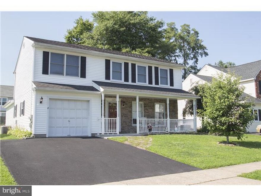 An inviting nicely landscaped fenced-in front porch greets you as you enter this beautiful well-maintained 2 story with one-car garage. Step inside and you will immediately feel the pride of ownership as you enter the formal living room complete with newer mahogany flooring which also wraps around into the dining room floor as well. Many other newer renovations/ upgrades are evident. These improvements include new carpeting in great room and bedrooms, new driveway, remodeled kitchen and baths. The huge, freshly painted, great/family room with cathedral ceiling and breakfast bar immediately transfers this dwelling from a house into a very desirable home. It is perfect for your family and family gatherings. Step up to the second floor and enter the Master Bedroom complete with a breathtaking master bath. There are also 3 other nice size bedrooms and bath off the upstairs hallway. Additional attic storage with wood flooring completes the second floor.  Exit the great room from the sliding glass door onto the spacious side deck with beautifully accented pavers. Great for barbequing or just chilling.  The rear yard also wraps around the other side of the house and currently contains an additional deck and storage shed.