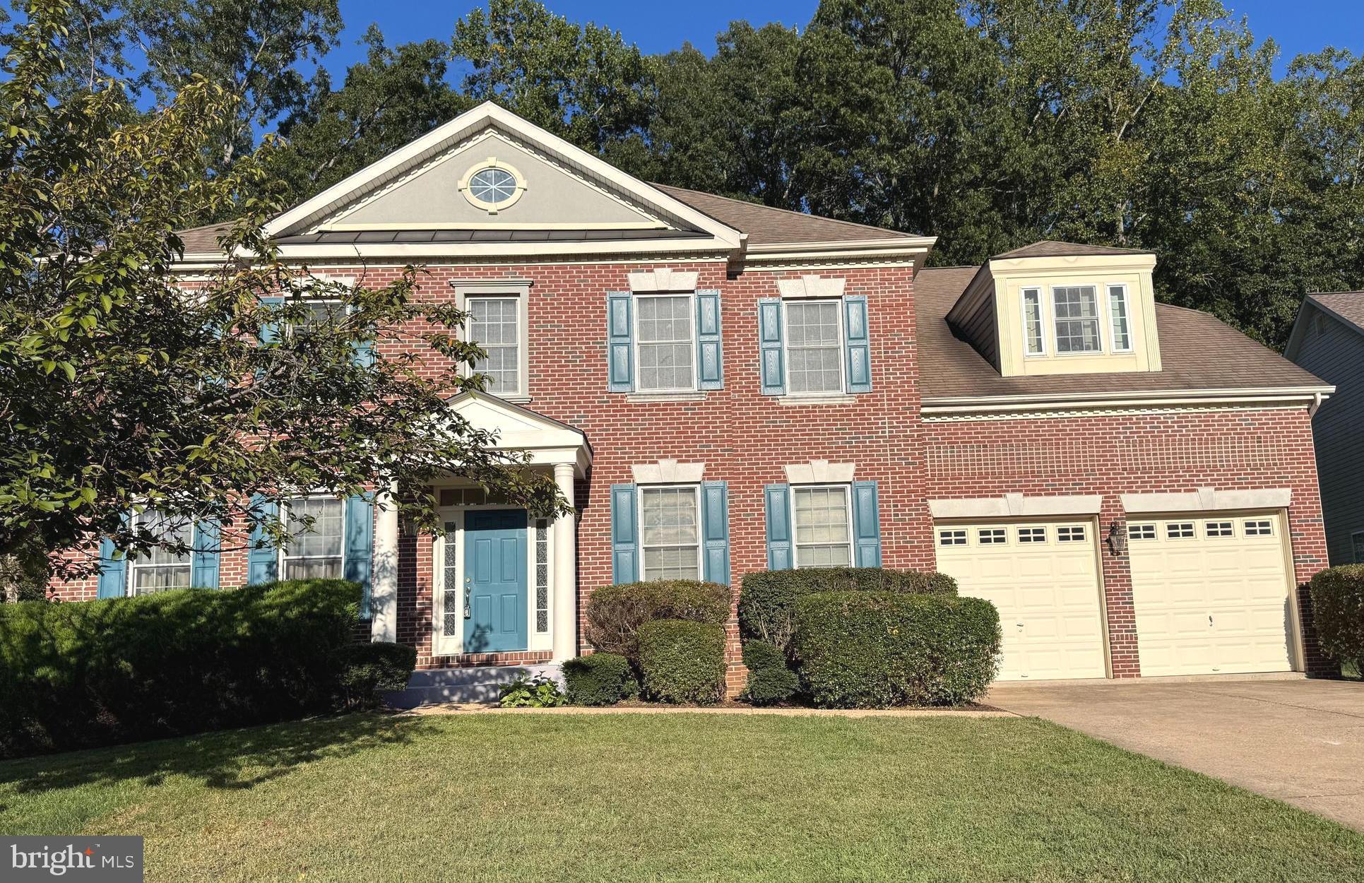 Welcome to this grand brick-front colonial nestled on a quiet cul-de-sac in the desirable Hunters Brooke community—offering spacious, elegant living surrounded by natural beauty and modern amenities.
Boasting over 6,000 square feet of total living space, this home features 4,116 sq ft on the upper two levels plus a fully finished basement with 1,928 sq ft—ideal for multi-functional living, entertaining, and relaxing.
Step into a wide foyer entrance with hardwood floors, flanked by a formal dining room on the right and a sitting room on the left. Just past the powder room and a private office/bonus room in the rear left corner, the home opens to a dramatic two-story living area filled with natural light from a wall of windows and anchored by a stone-faced, two-story gas fireplace—a true focal point for the space.
The spacious kitchen is a chef’s dream, featuring stainless steel appliances, gas cooktop on a central island, and generous room for a table beneath skylights that fill the space with daylight. A door leading from the kitchen area directly to the back patio, perfect for seamless indoor-outdoor entertaining. Nearby, access to the laundry room and attached 2-car garage adds everyday convenience.
Upstairs, you'll find four generously sized bedrooms, all with ceiling fans, including a luxurious owner’s suite with a sitting area, expansive walk-in closet, and tiled ensuite bath featuring dual vanities, a jetted tub, walk-in shower, and two linen closets. Two bedrooms are connected by a spacious Jack and Jill bathroom, while the fourth bedroom is located near another full bath—offering privacy for guests or family.
The fully finished basement is an entertainer’s dream, with flexible spaces for a pool or ping pong table, bar area, weight room, media/entertainment room, and a bonus room with closet that could serve as a 5th bedroom, plus a full bath for convenience.
Outside, the private backyard backs to a wooded preserve, creating a peaceful natural retreat. The spacious patio offers plenty of room for outdoor dining or relaxing, and the low-maintenance yard is perfectly sized—not too big to manage, but large enough to enjoy. Ceiling fans are also found in the main-level office and two-story living area, helping to keep the home cool and comfortable.
Located just 15 minutes from La Plata, with access to shopping, dining, hospital and medical centers and offering an easy commute to the Naval Base at Indian Head, south to NSWC at Dahlgren, VA or nearby Rte 210 for points north to National Harbor, Wash, DC and Alexandria VA this home delivers both tranquility and convenience.
Enjoy the amenities of the Hunters Brooke community, including a pool, playgrounds, and scenic walking areas, all while living in a spacious home that truly has it all.